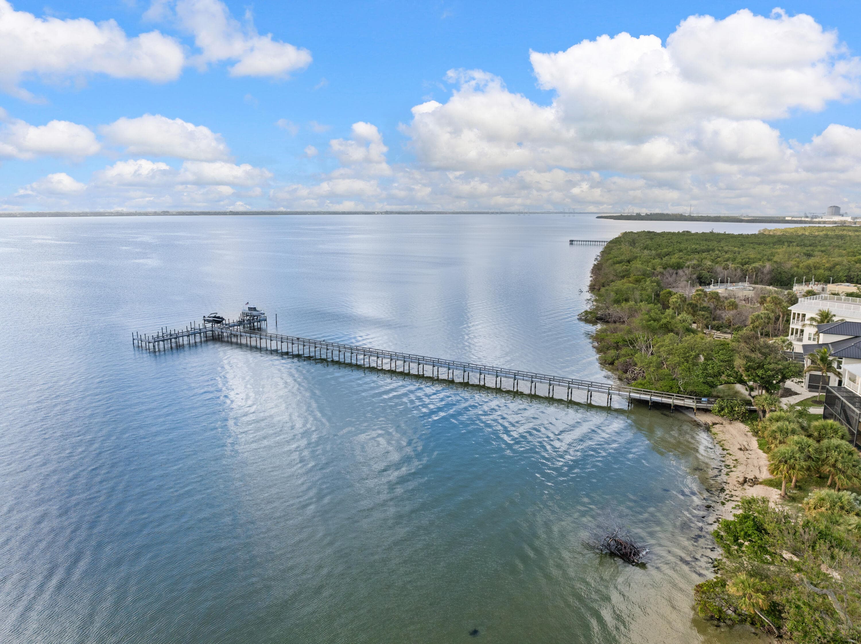 7671 Pelican Pointe Drive, Jensen Beach, FL 34957 — photo 1 of 15