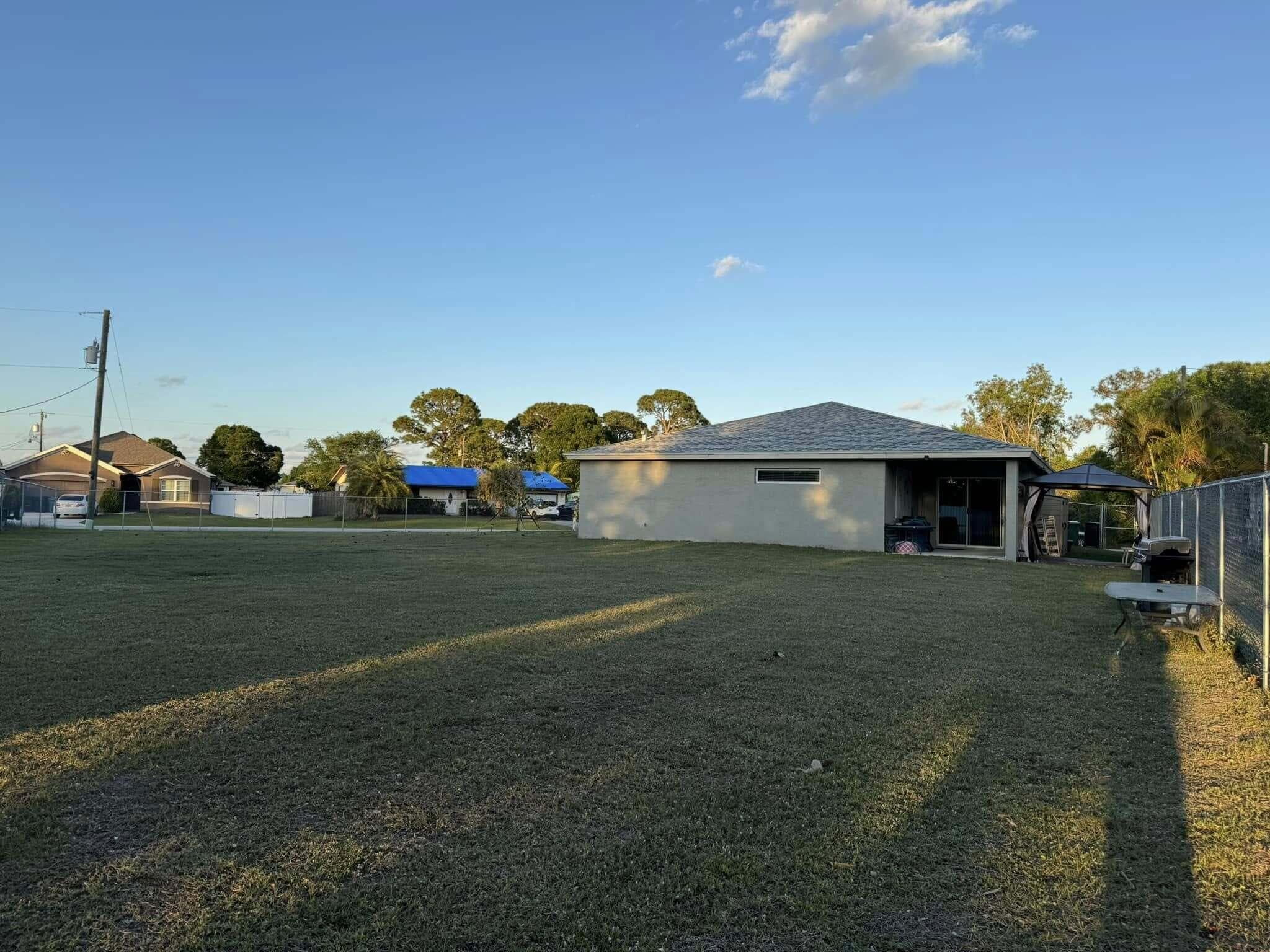 425 NW Hutchins Street, Port St. Lucie, FL 34983 — photo 3 of 36