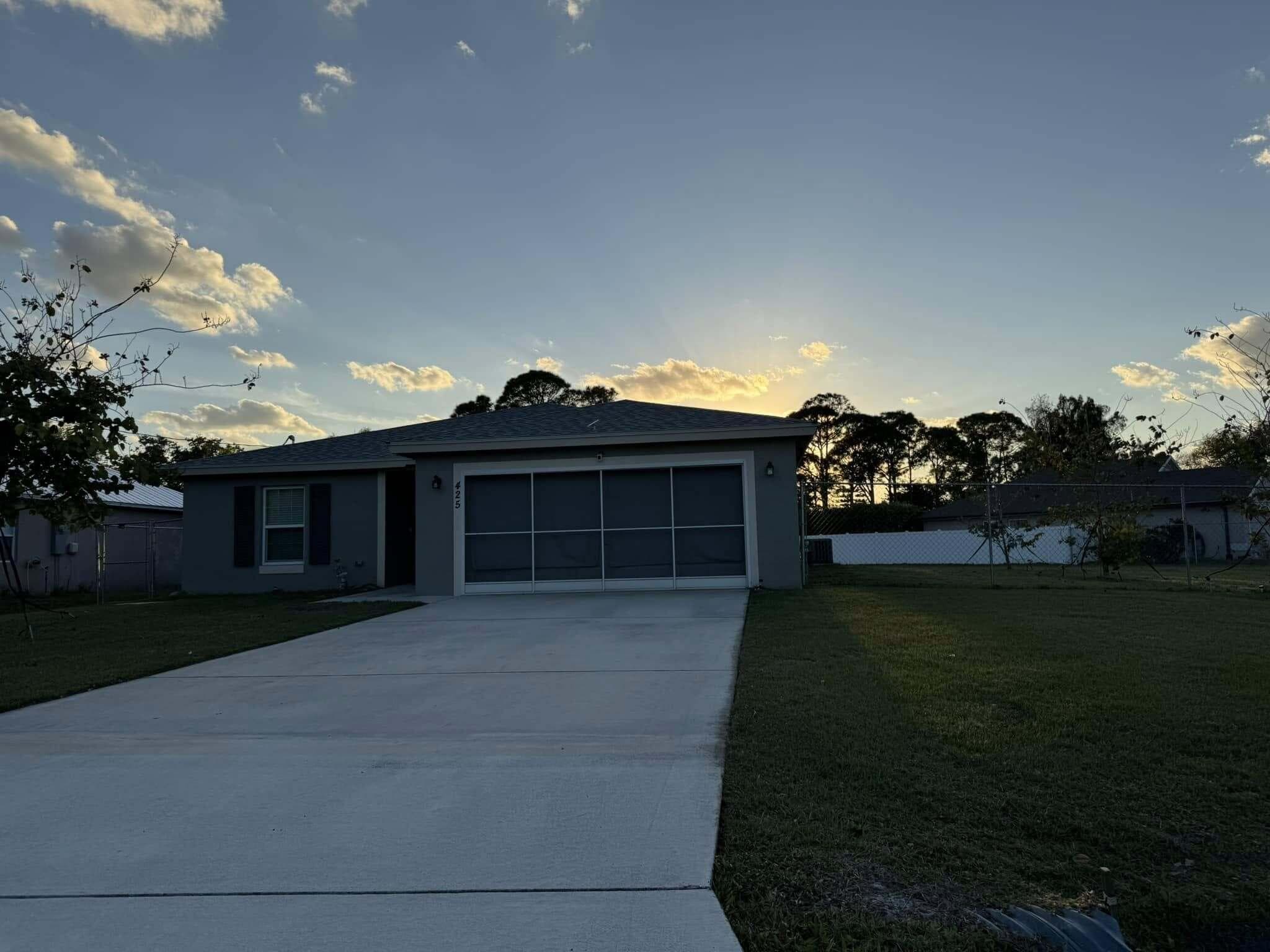425 NW Hutchins Street, Port St. Lucie, FL 34983 — photo 1 of 36