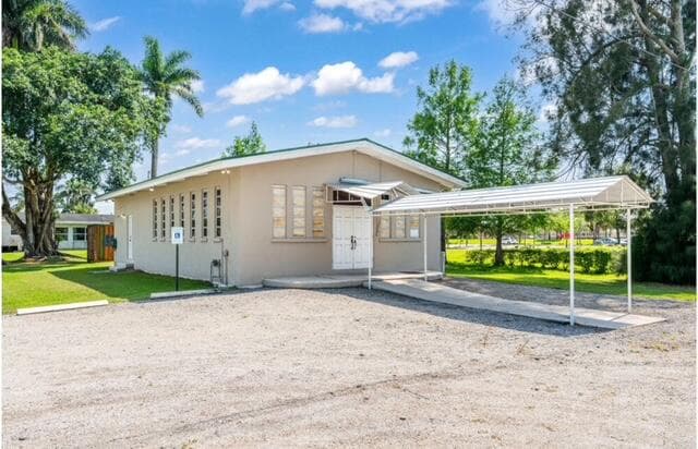 224 NW G Avenue, Belle Glade, FL 33430 — photo 1 of 17