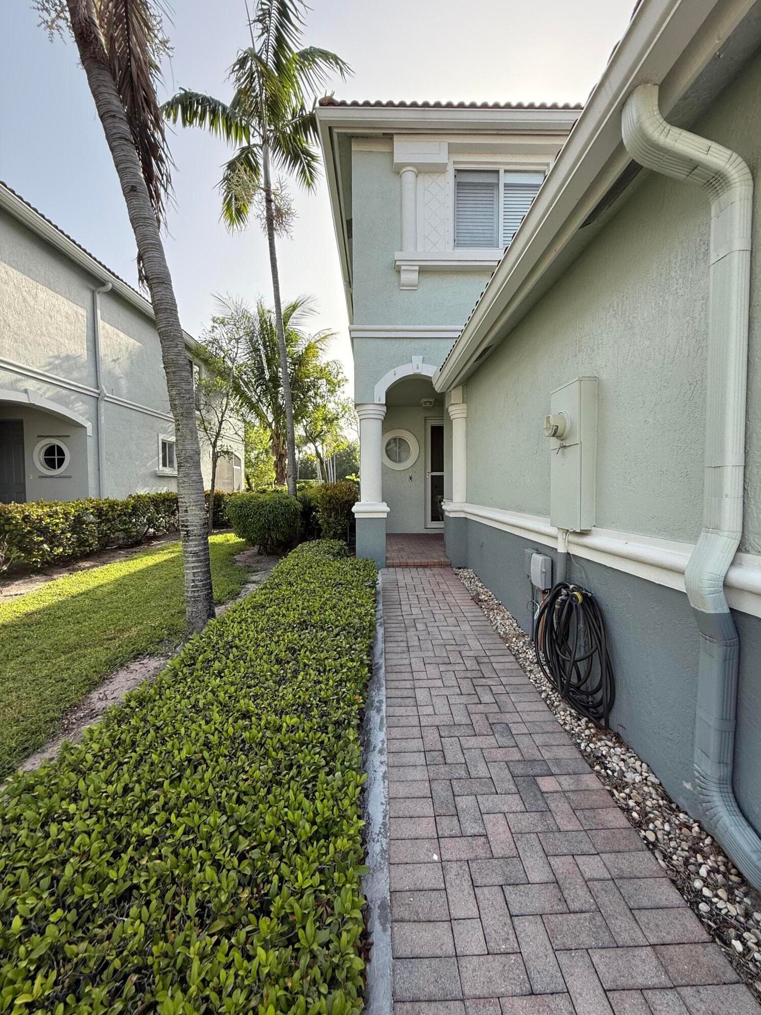 2136 Oakmont Drive, Riviera Beach, FL 33404 — photo 2 of 34