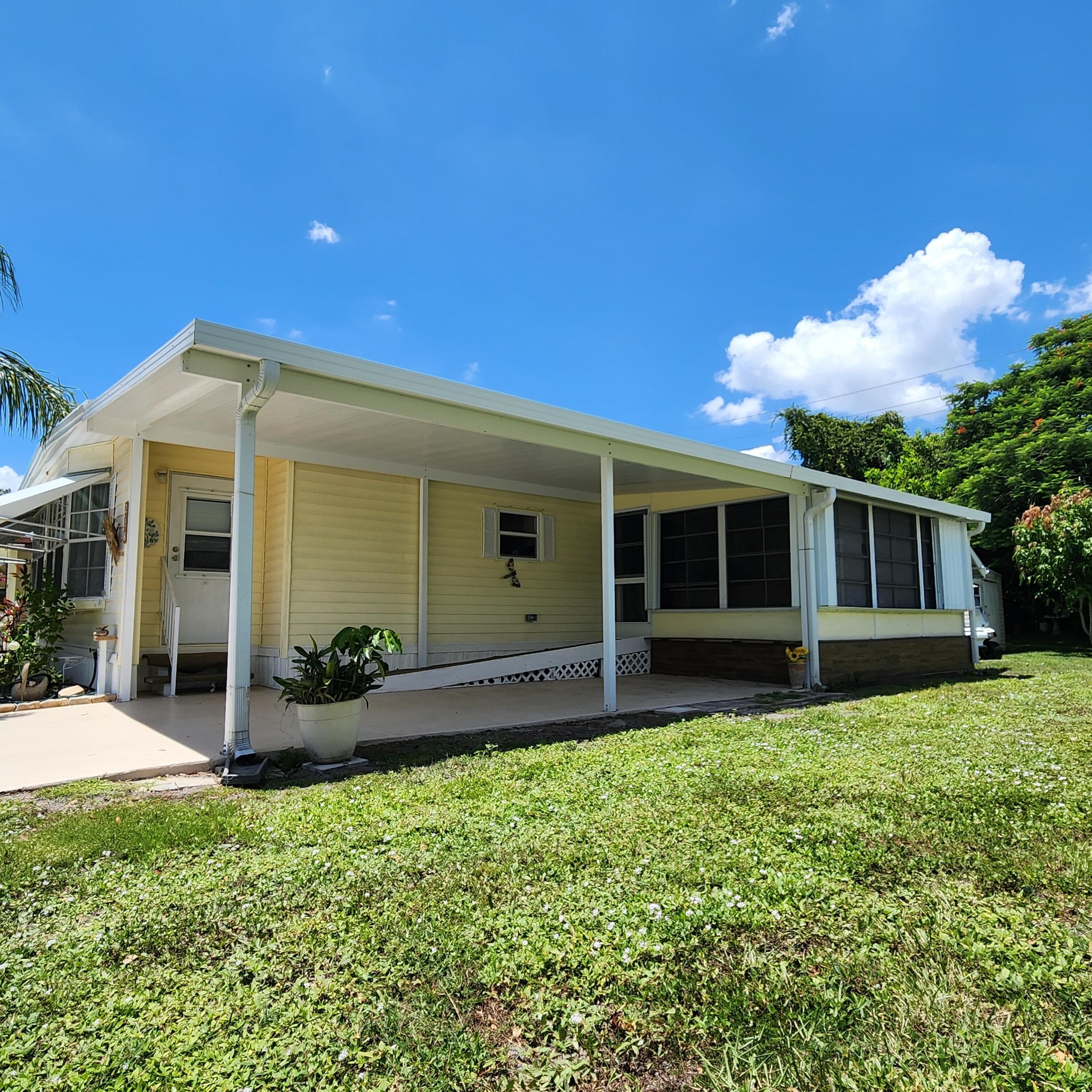 218 W Caribbean, Port St. Lucie, FL 34952 — photo 1 of 97