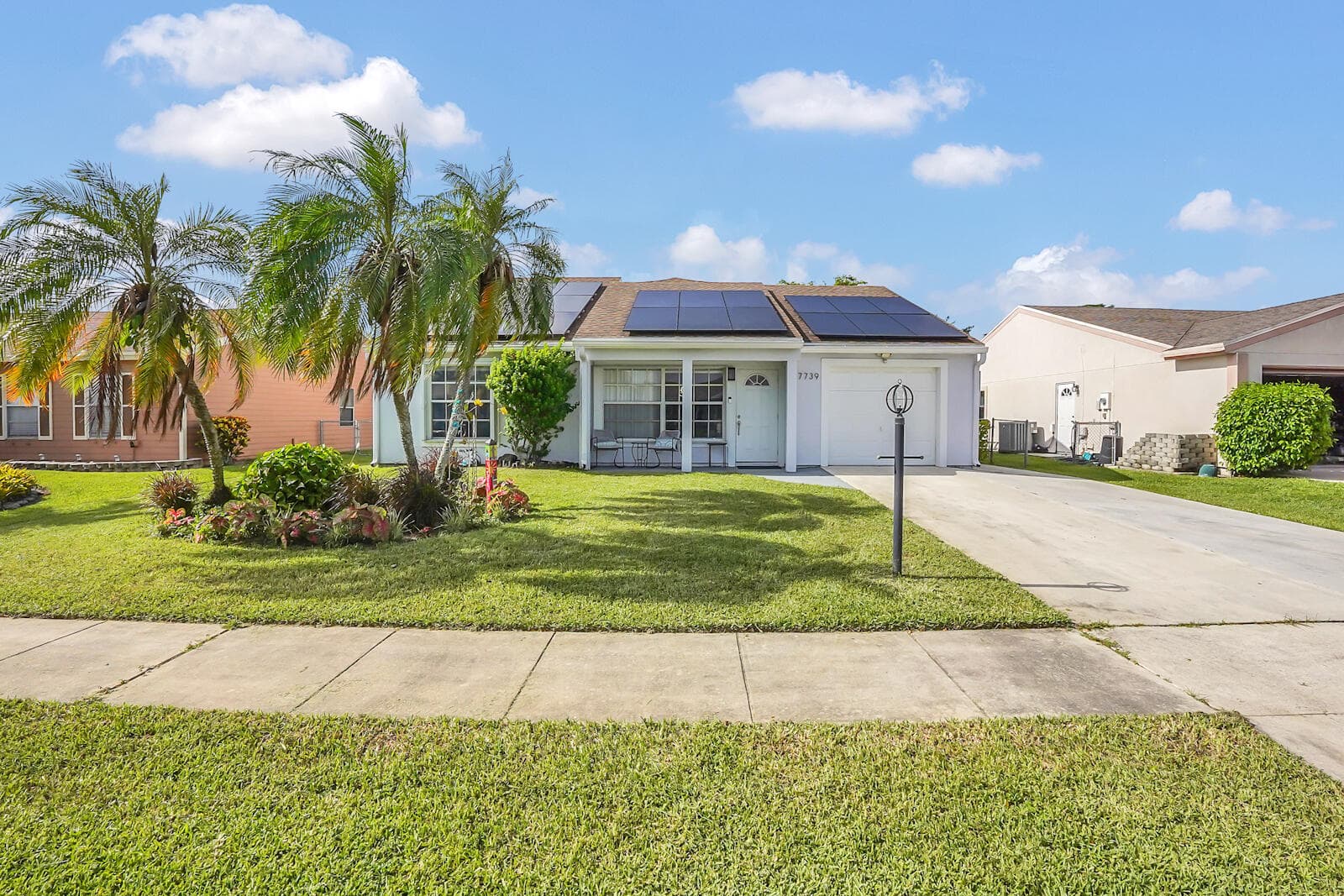7739 Canal Drive, Lake Worth, FL 33467 — photo 1 of 35