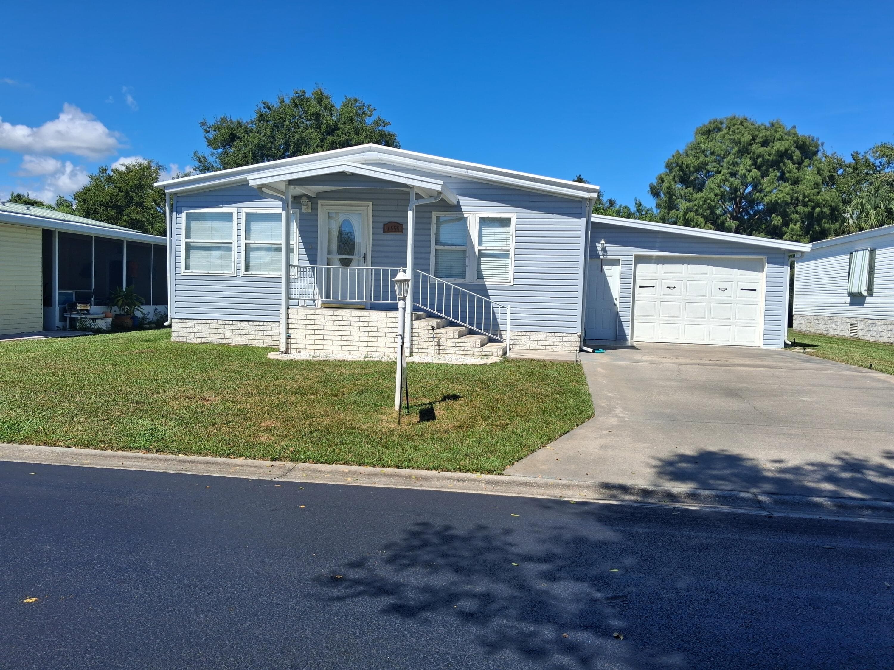 1555 SW 35 Circle, Okeechobee, FL 34974 — photo 1 of 39