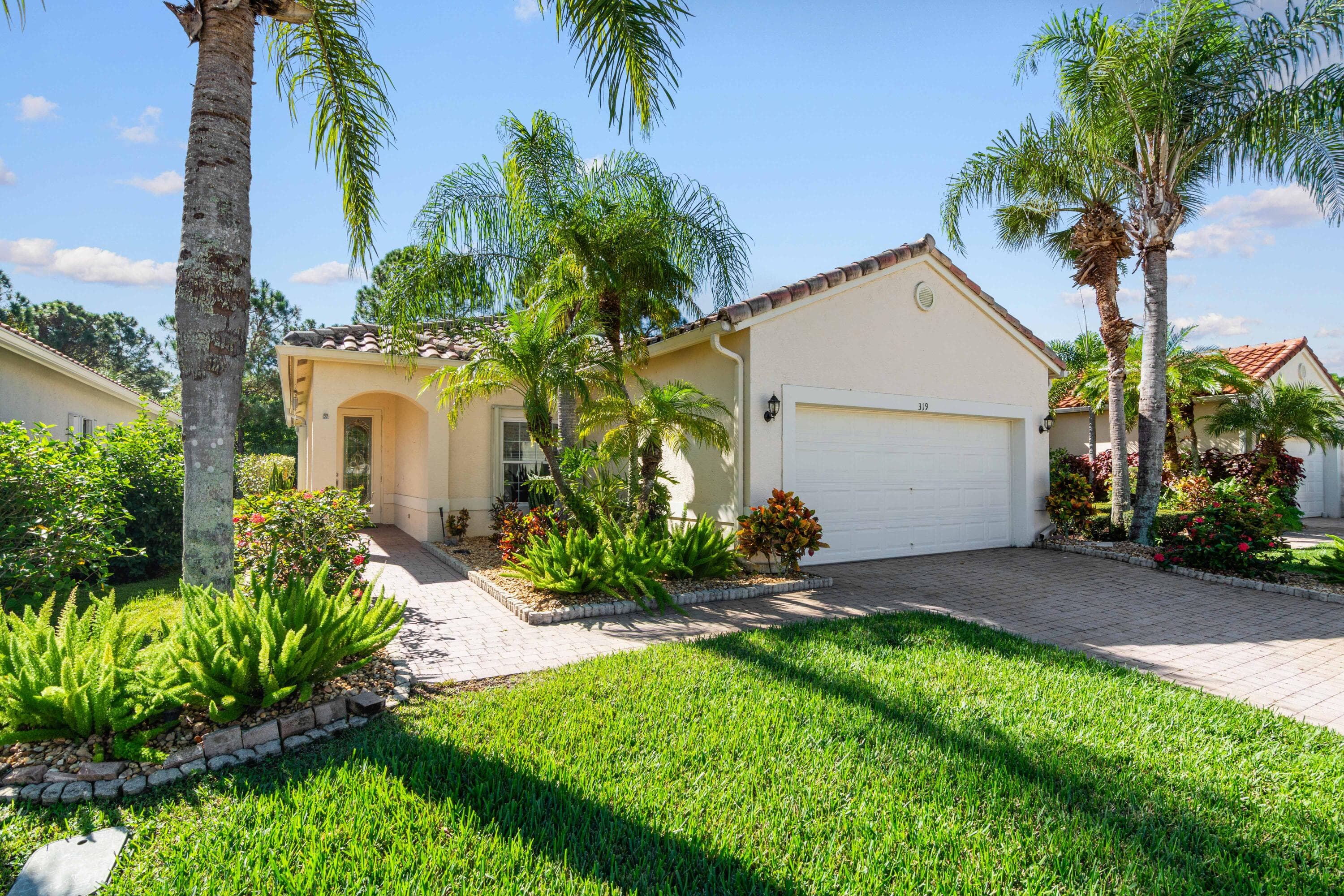 319 NW Treeline Trace, Port St. Lucie, FL 34986 — photo 1 of 56