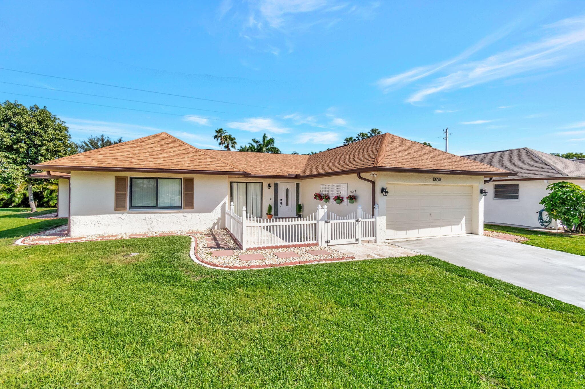 10298 Greentrail Drive N, Boynton Beach, FL 33436 — photo 1 of 51
