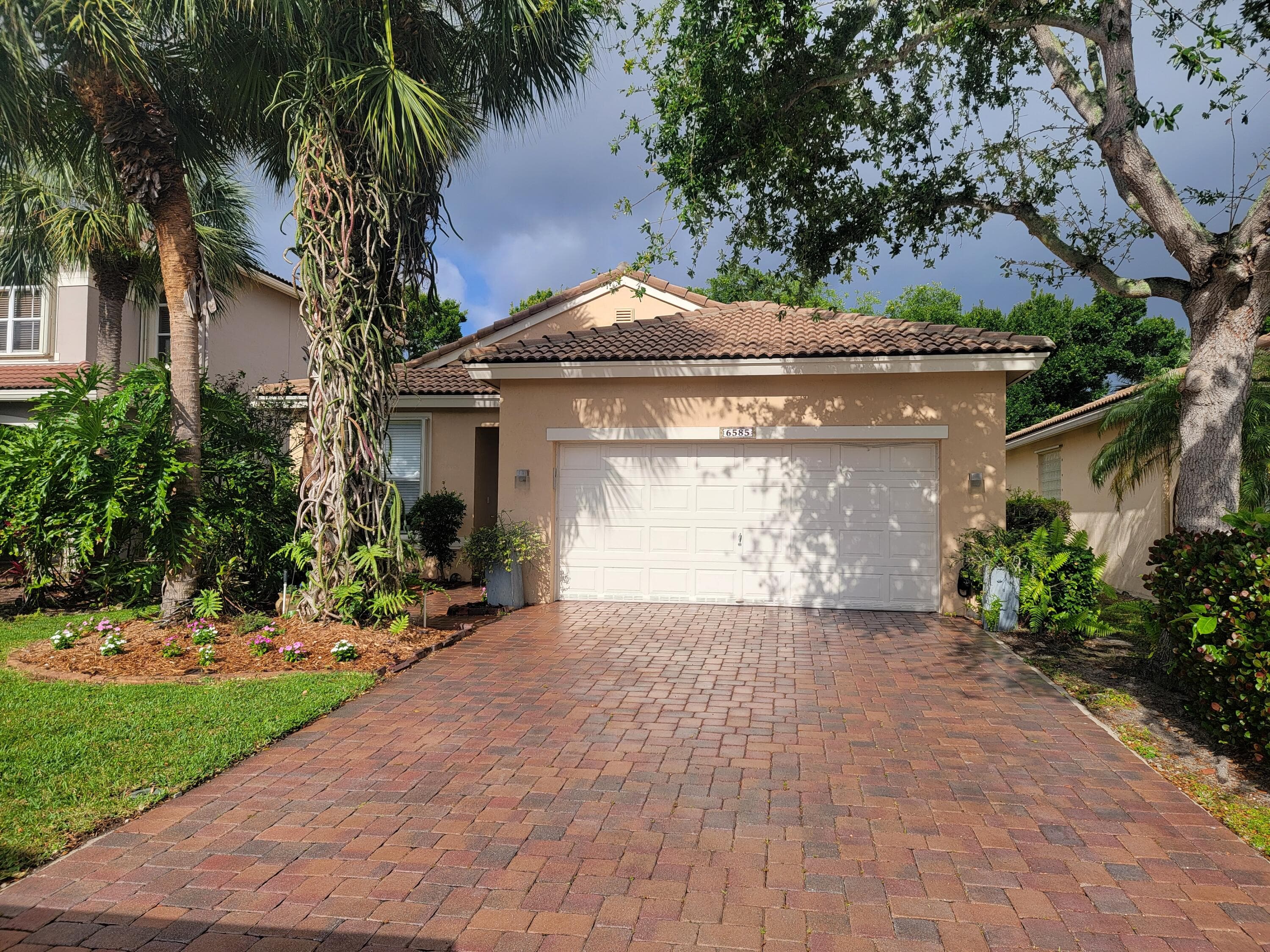 6585 Lurais Drive, Lake Worth, FL 33463 — photo 1 of 42