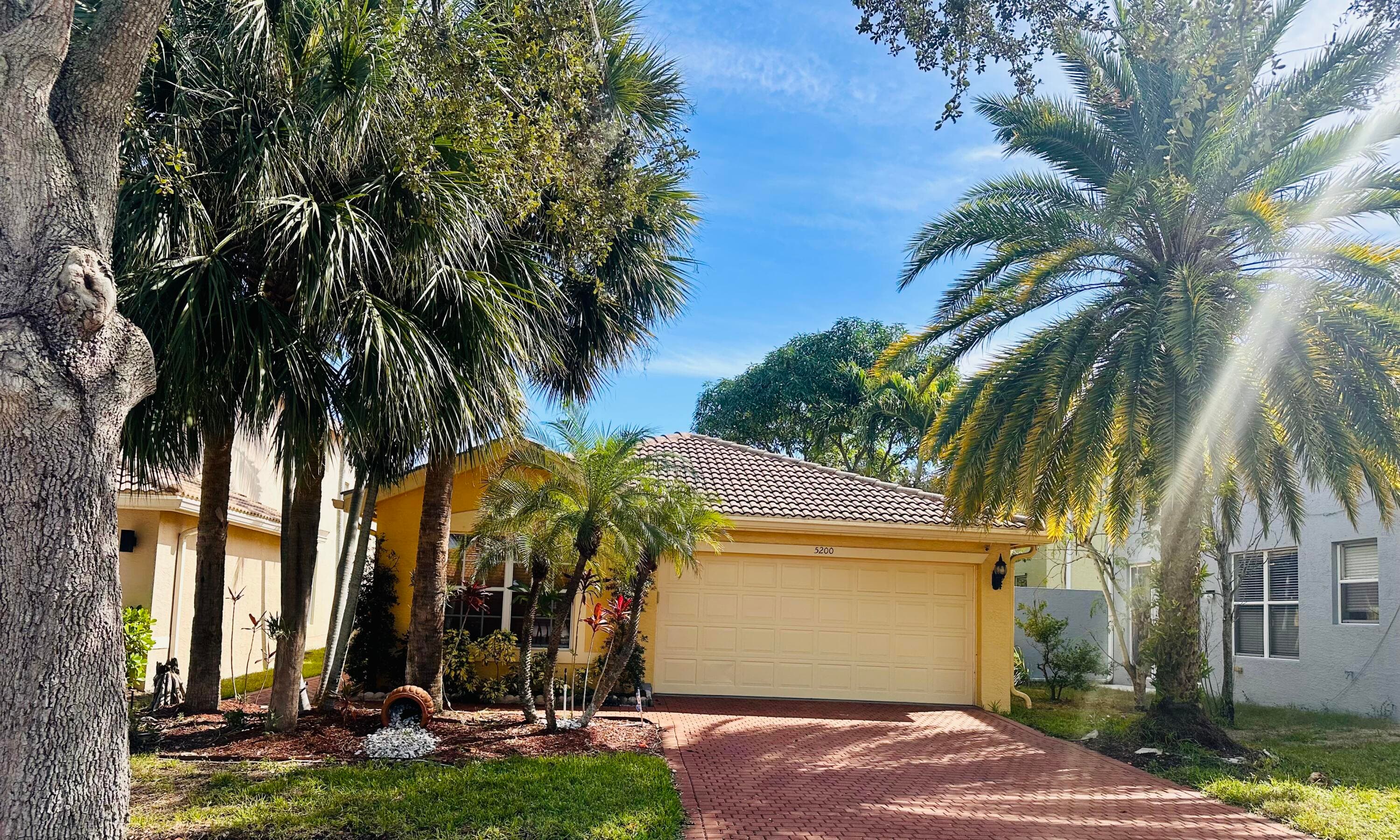 5200 Rising Comet Lane, Greenacres, FL 33463 — photo 1 of 50