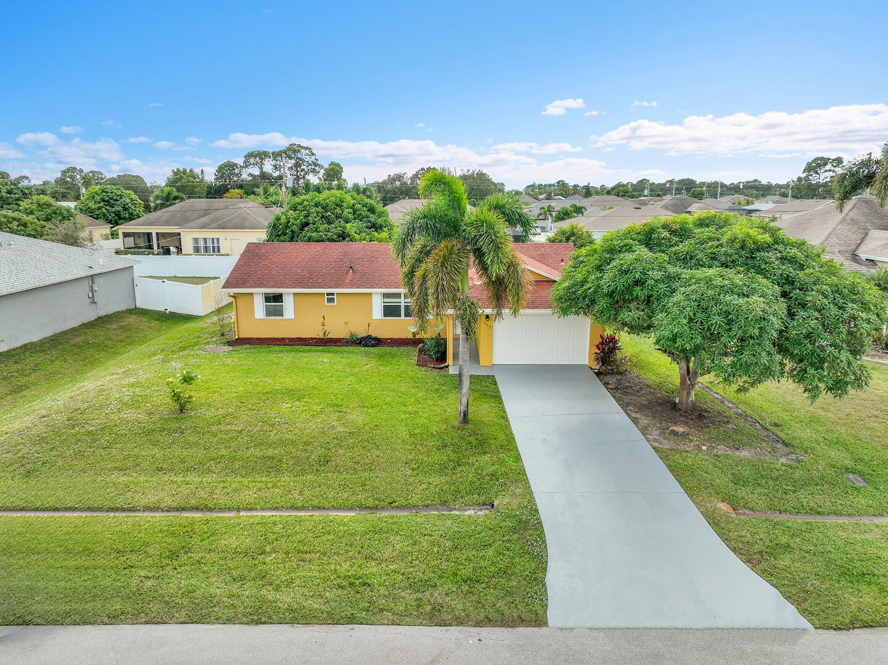 1652 SW Crawford Avenue, Port St. Lucie, FL 34953 — photo 5 of 42