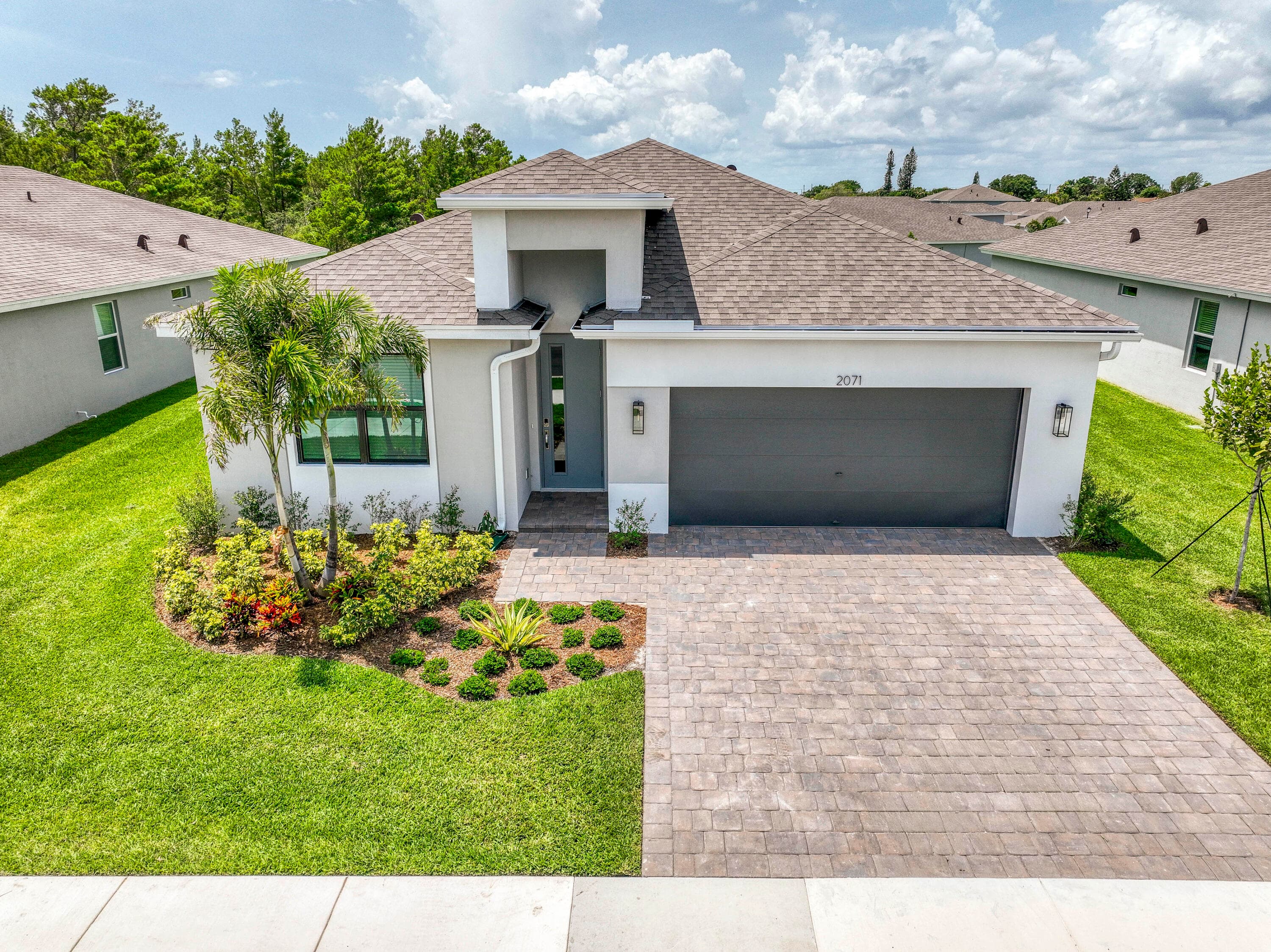 2071 NE Cedar Street, Jensen Beach, FL 34957 — photo 1 of 34