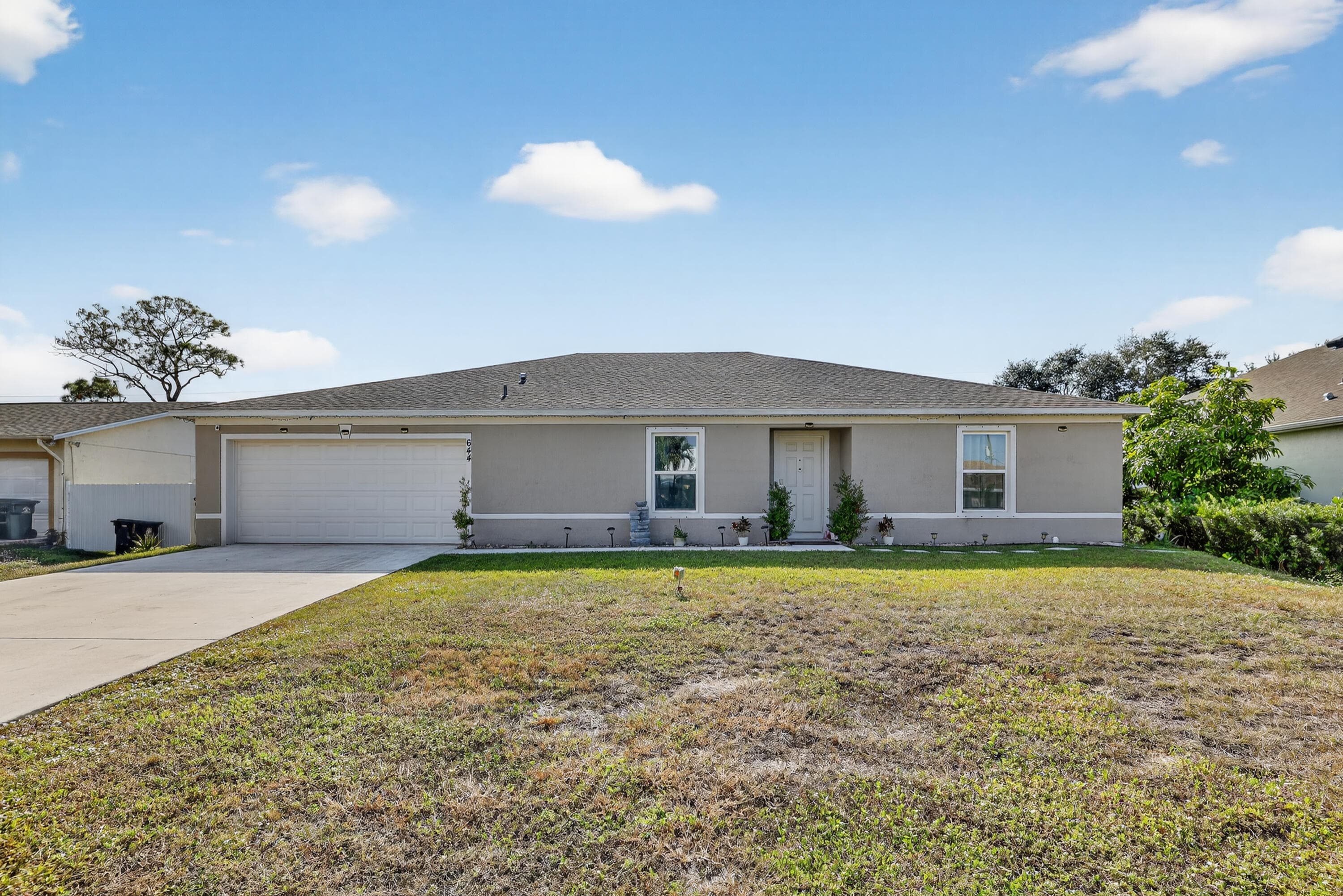 644 SW Hoffenberg Avenue, Port St. Lucie, FL 34953 — photo 1 of 37