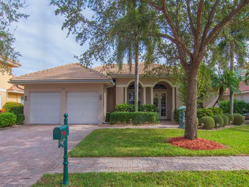 6124 57th Court, Vero Beach, FL 32967 — photo 1 of 55