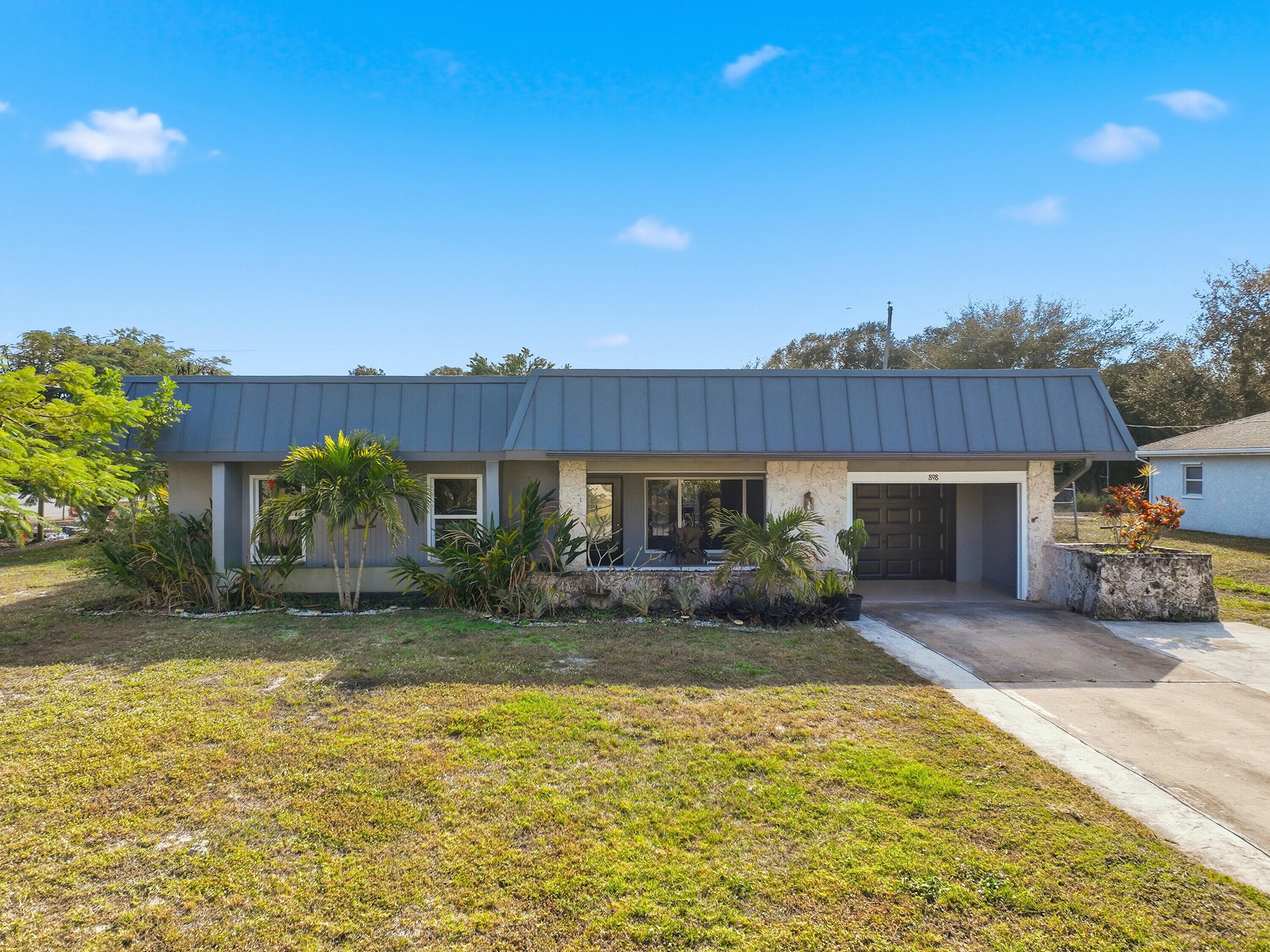 898 SE Evergreen Terrace, Port St. Lucie, FL 34983 — photo 2 of 46