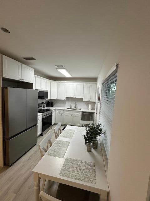 522 Eastwind Drive, North Palm Beach, FL 33408 — photo 2 of 11