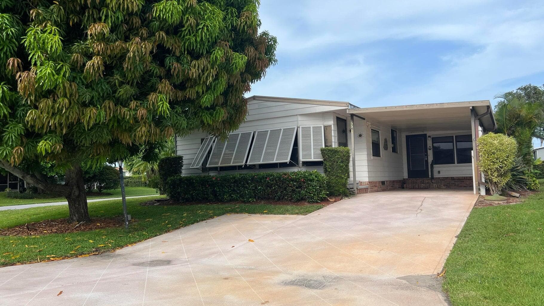 7761 SE Shenandoah Drive, Hobe Sound, FL 33455 — photo 1 of 21