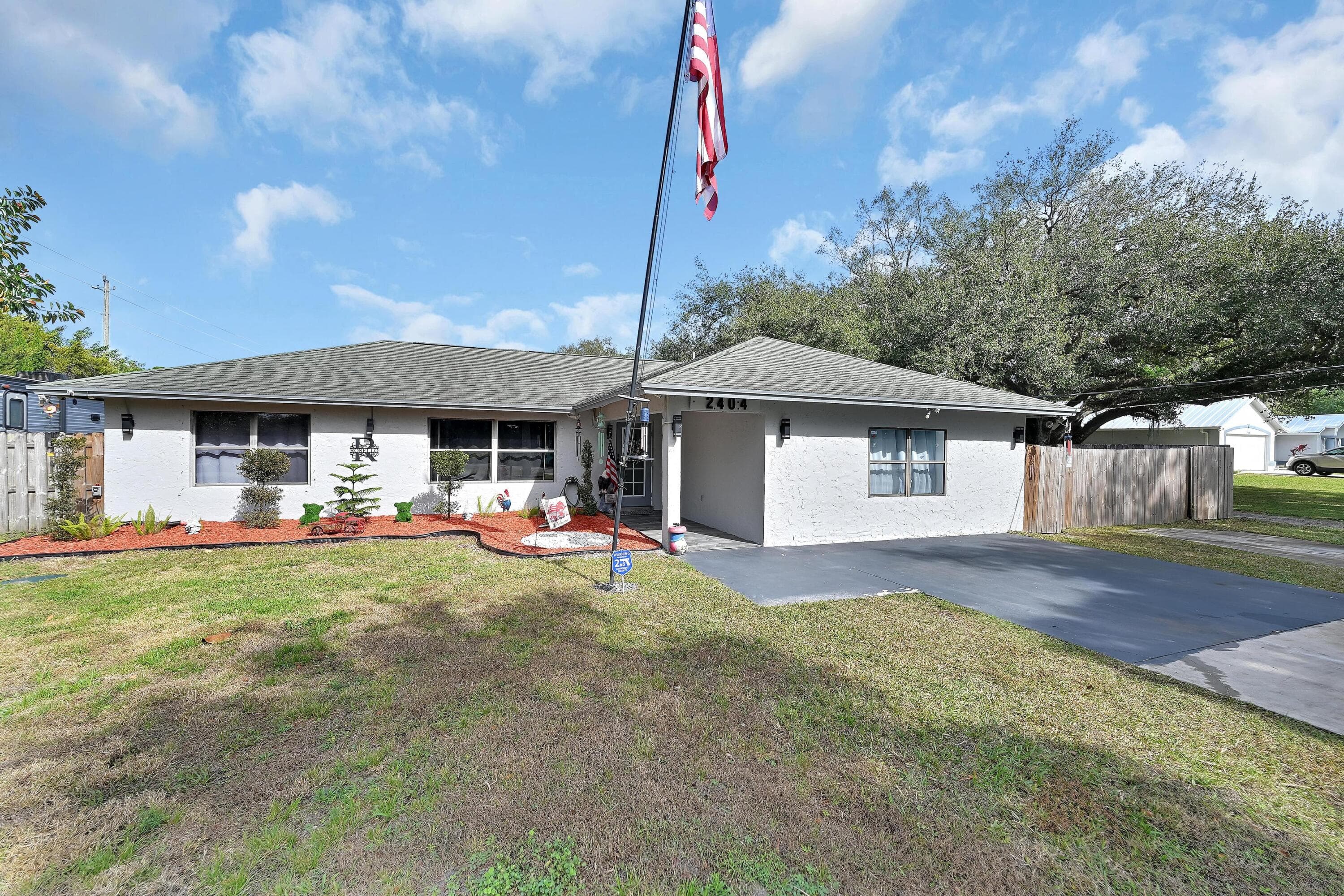 2404 Dade Road, Fort Pierce, FL 34982 — photo 1 of 61