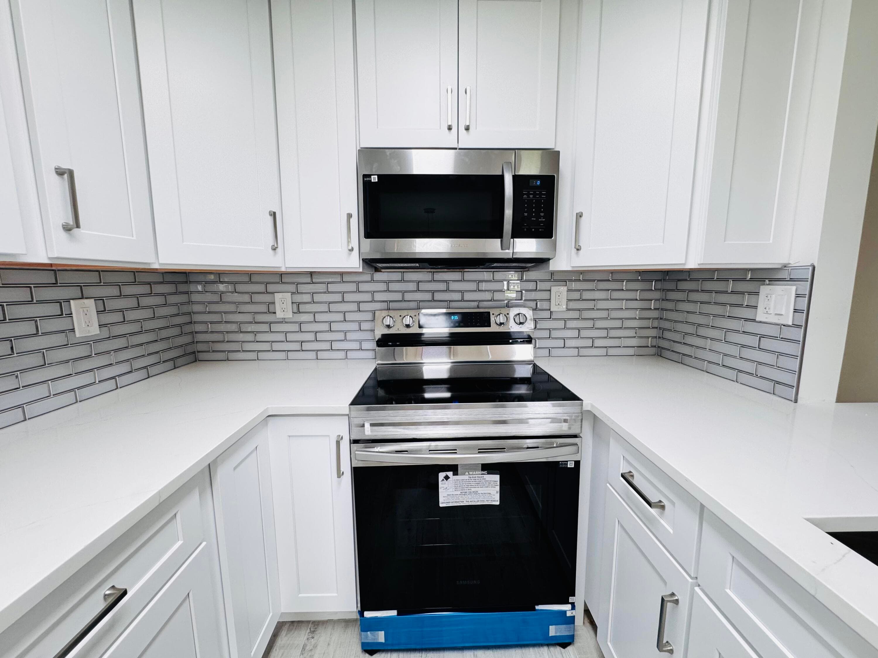 293 Flanders G, Delray Beach, FL 33484 — photo 1 of 35