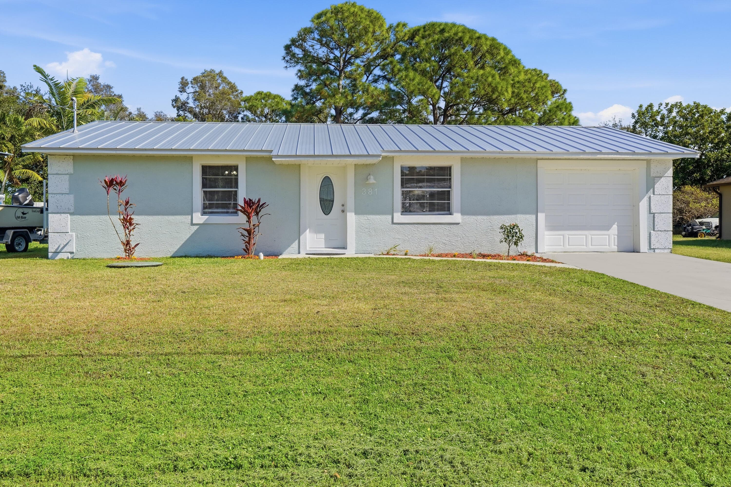 381 NW Curtis Street, Port St. Lucie, FL 34983 — photo 2 of 36