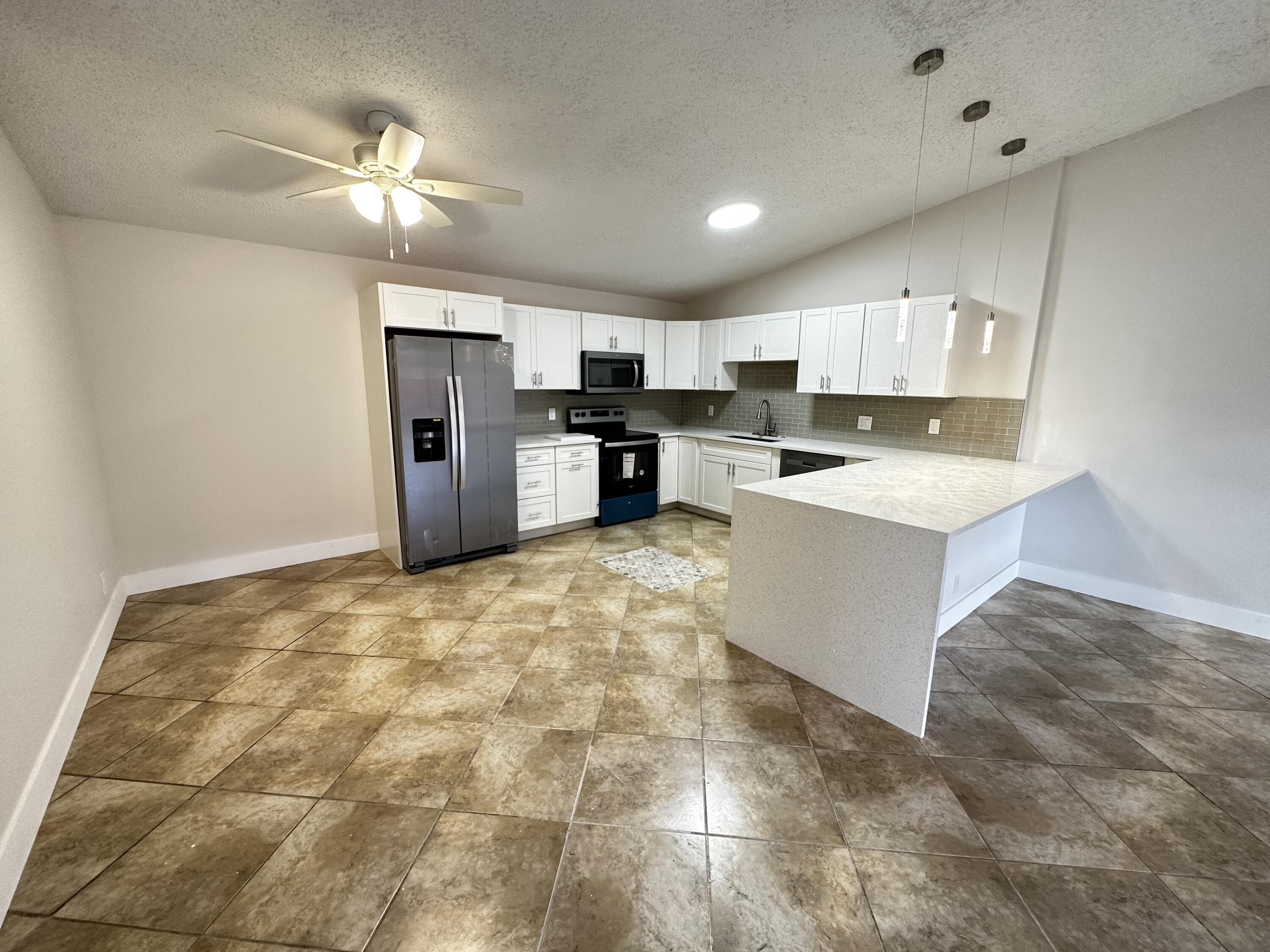 4326 Woodstock Drive C, West Palm Beach, FL 33409 — photo 1 of 41
