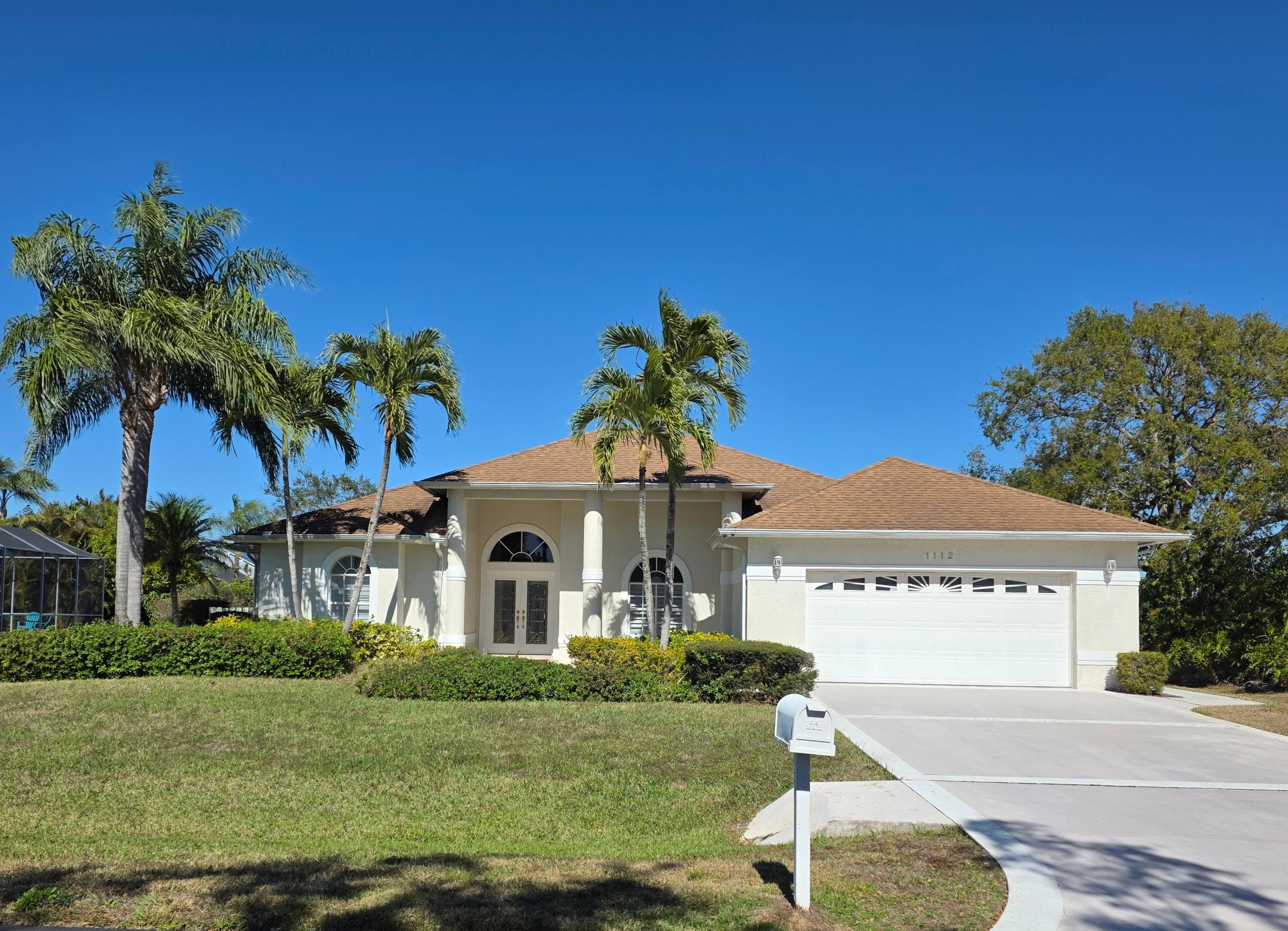 1112 SE Strathmore Drive, Port St. Lucie, FL 34952 — photo 1 of 58