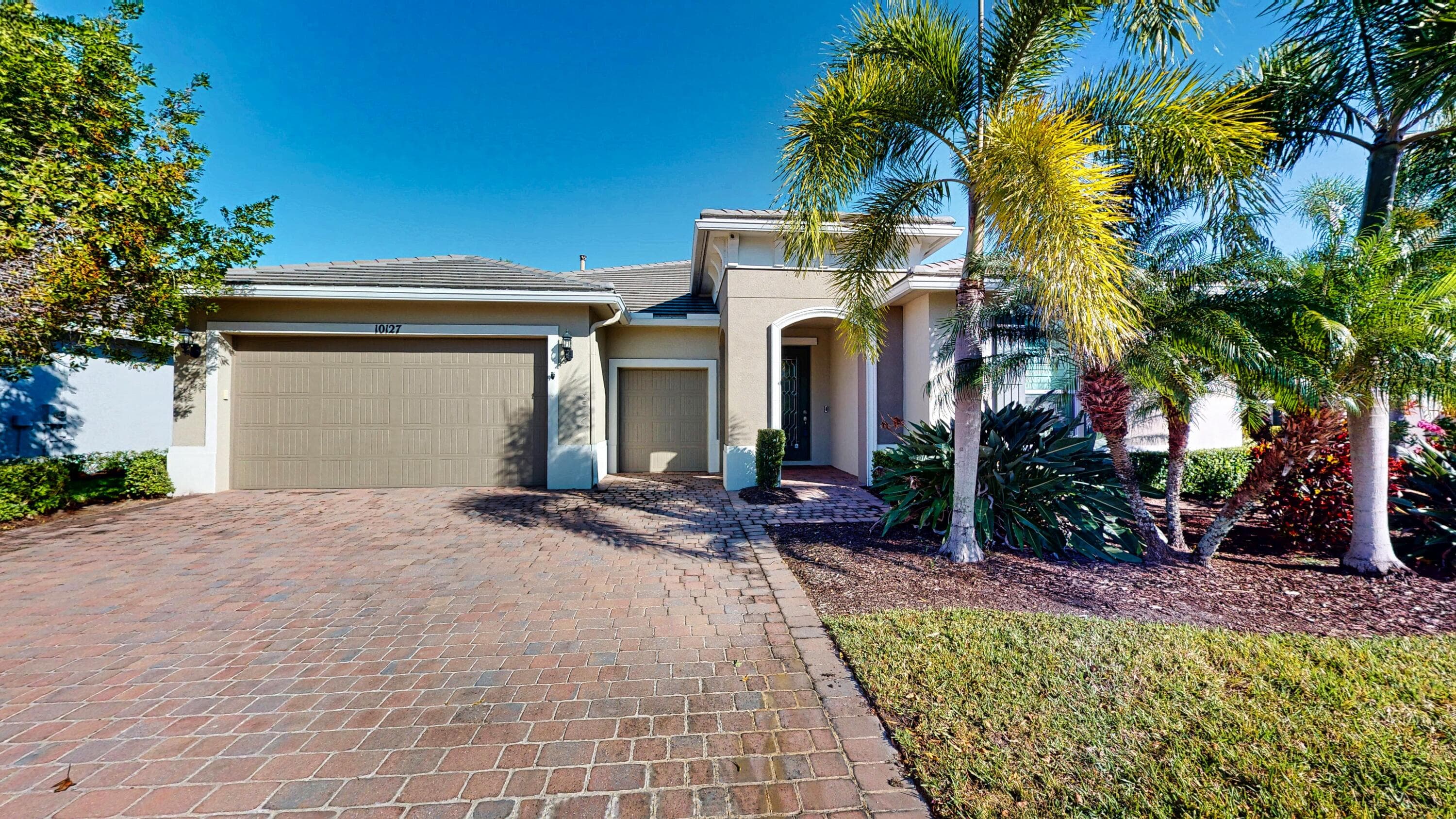10127 SW Cypress Wood Court, Port St. Lucie, FL 34987 — photo 1 of 60
