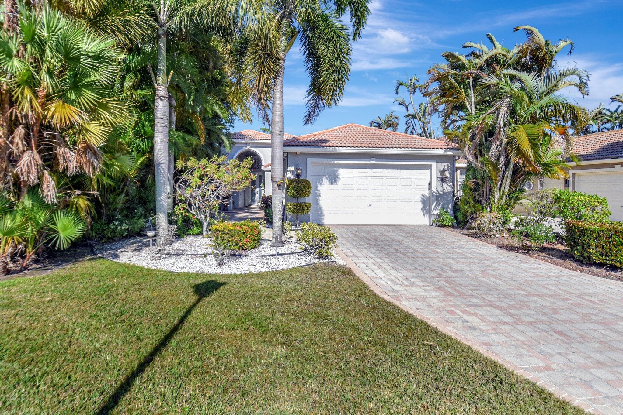 4022 Manchester Lake Drive, Lake Worth, FL 33449 — photo 1 of 67