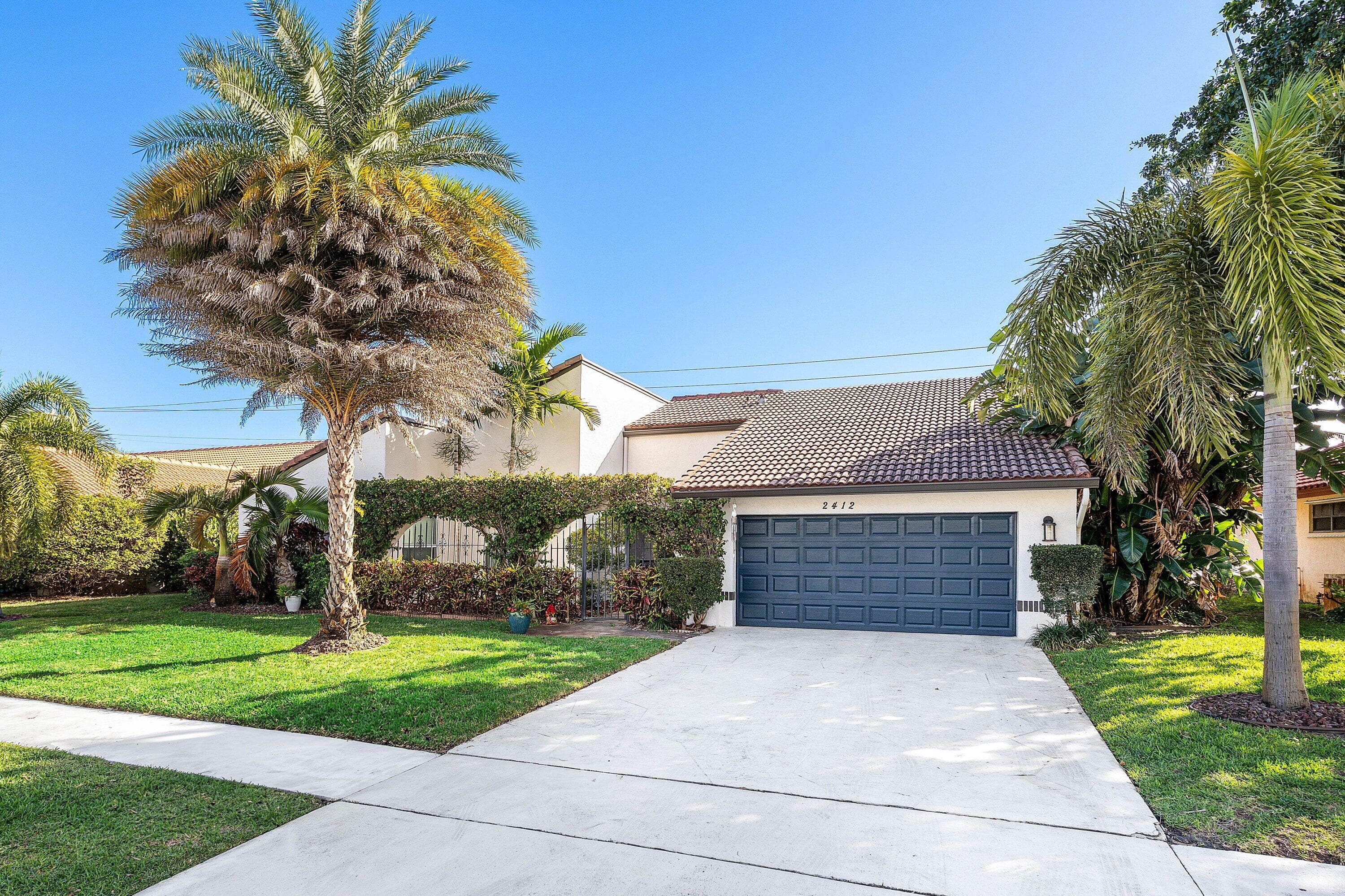 2412 SW 23rd Cranbrook Drive, Boynton Beach, FL 33436 — photo 1 of 45
