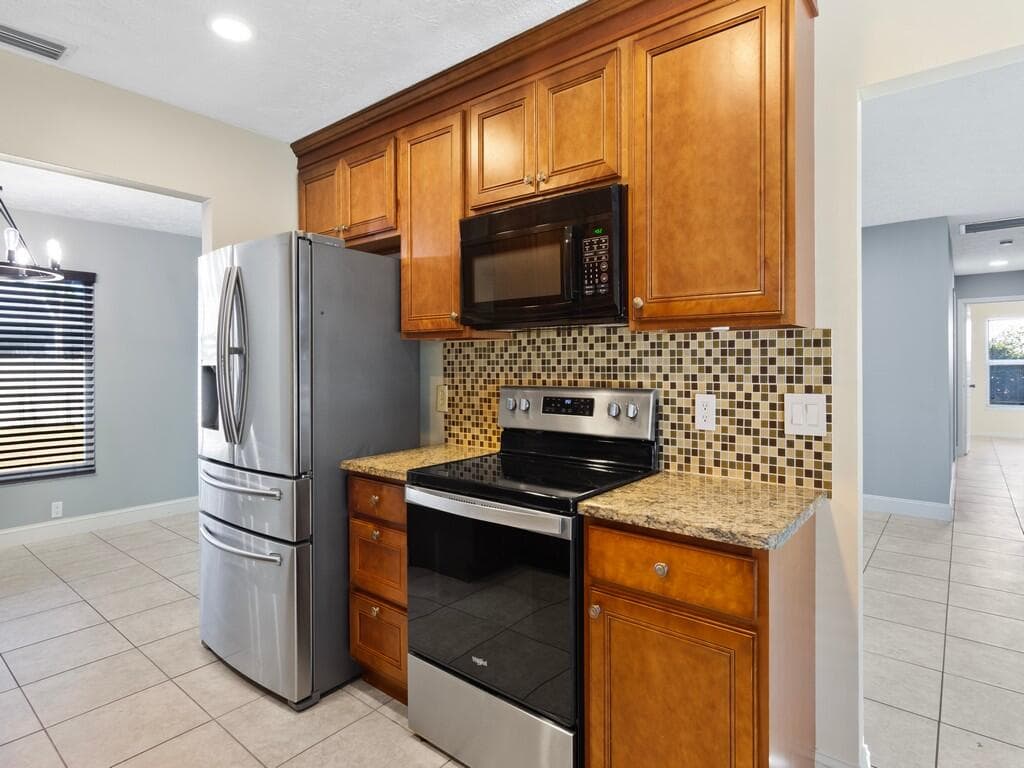 1365 SW Parma Avenue, Port St. Lucie, FL 34953 — photo 9 of 23