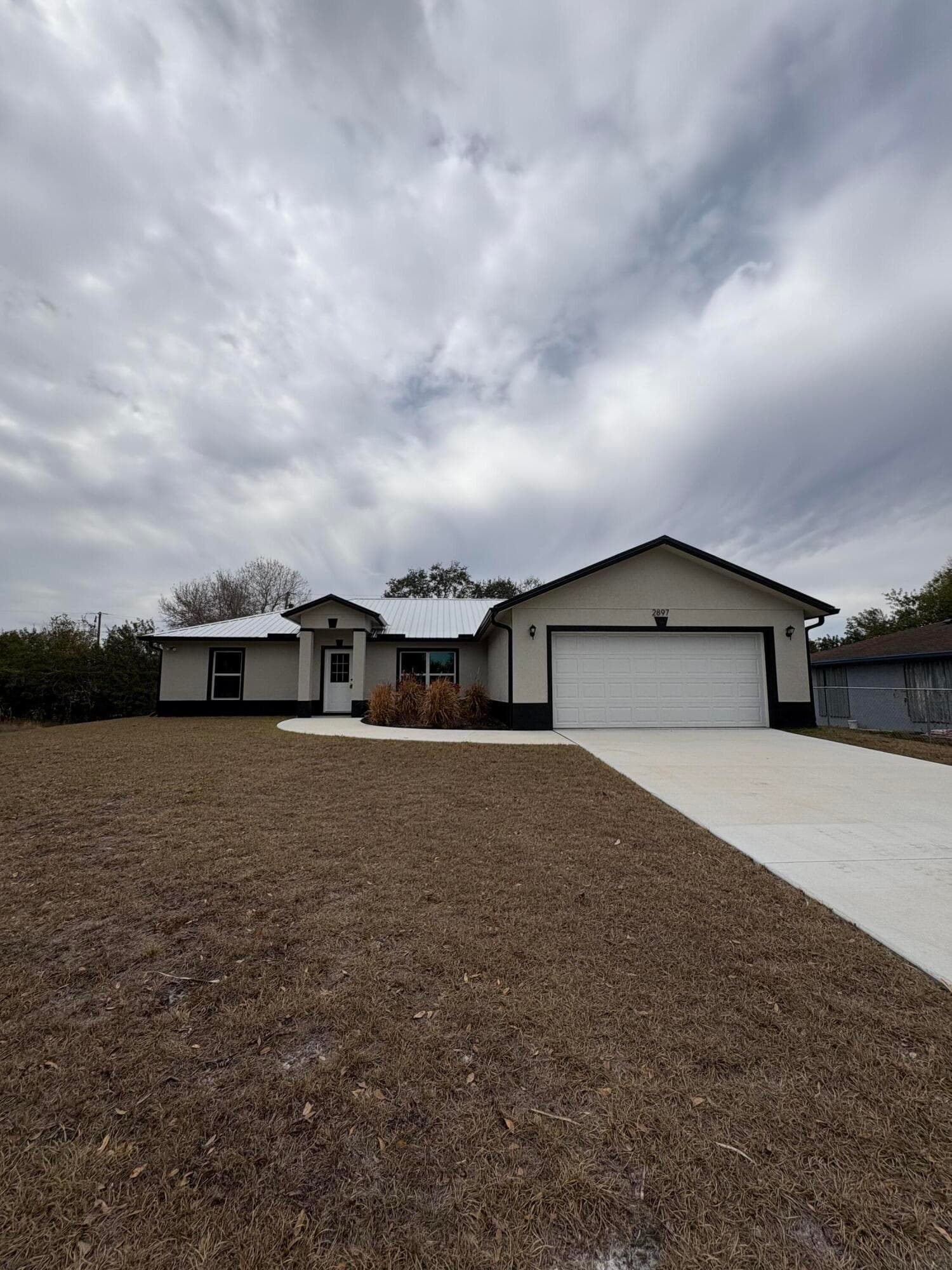 2897 NW 37th Avenue, Okeechobee, FL 34972 — photo 1 of 19