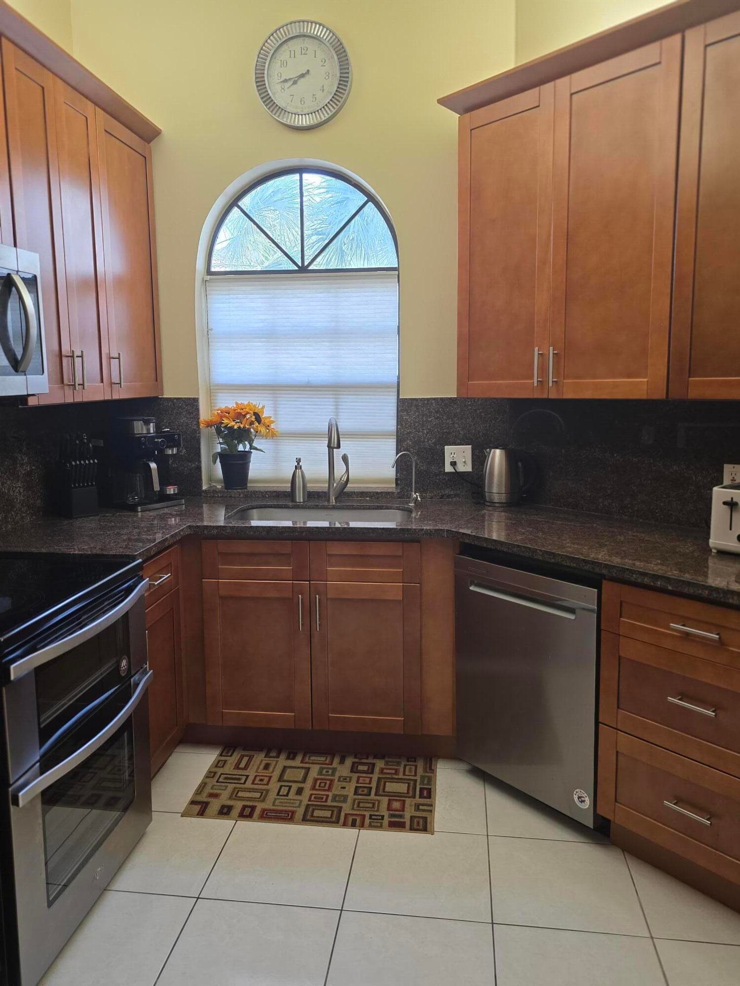 5243 Europa Drive N, Boynton Beach, FL 33437 — photo 1 of 50