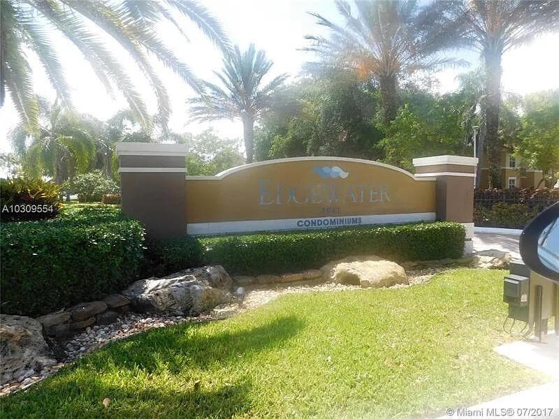 8781 Wiles Road 203, Coral Springs, FL 33067 — photo 2 of 22
