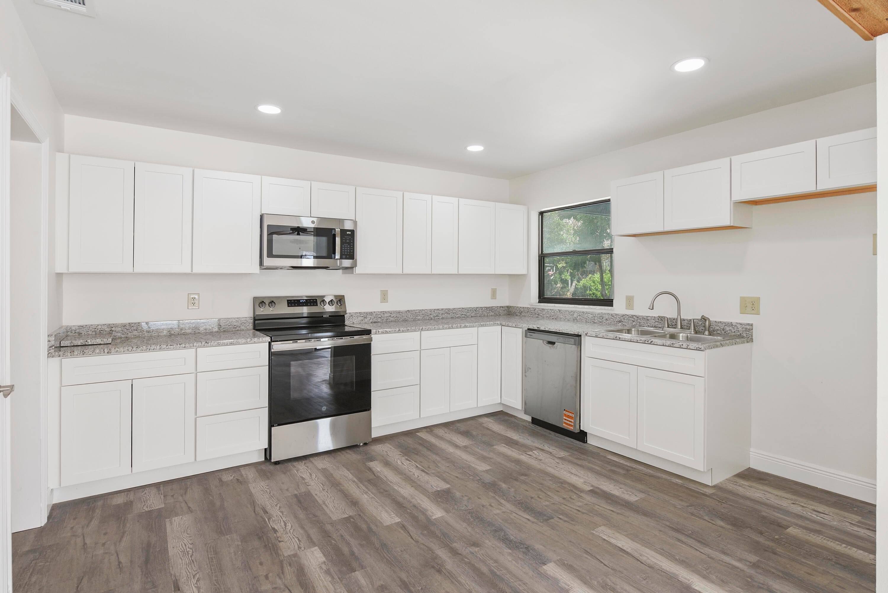 5666 SE Matousek Street, Stuart, FL 34997 — photo 2 of 49