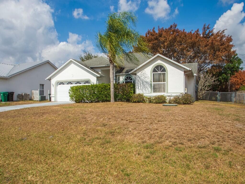5718 NW North Macedo Boulevard, Port St. Lucie, FL 34983 — photo 1 of 37
