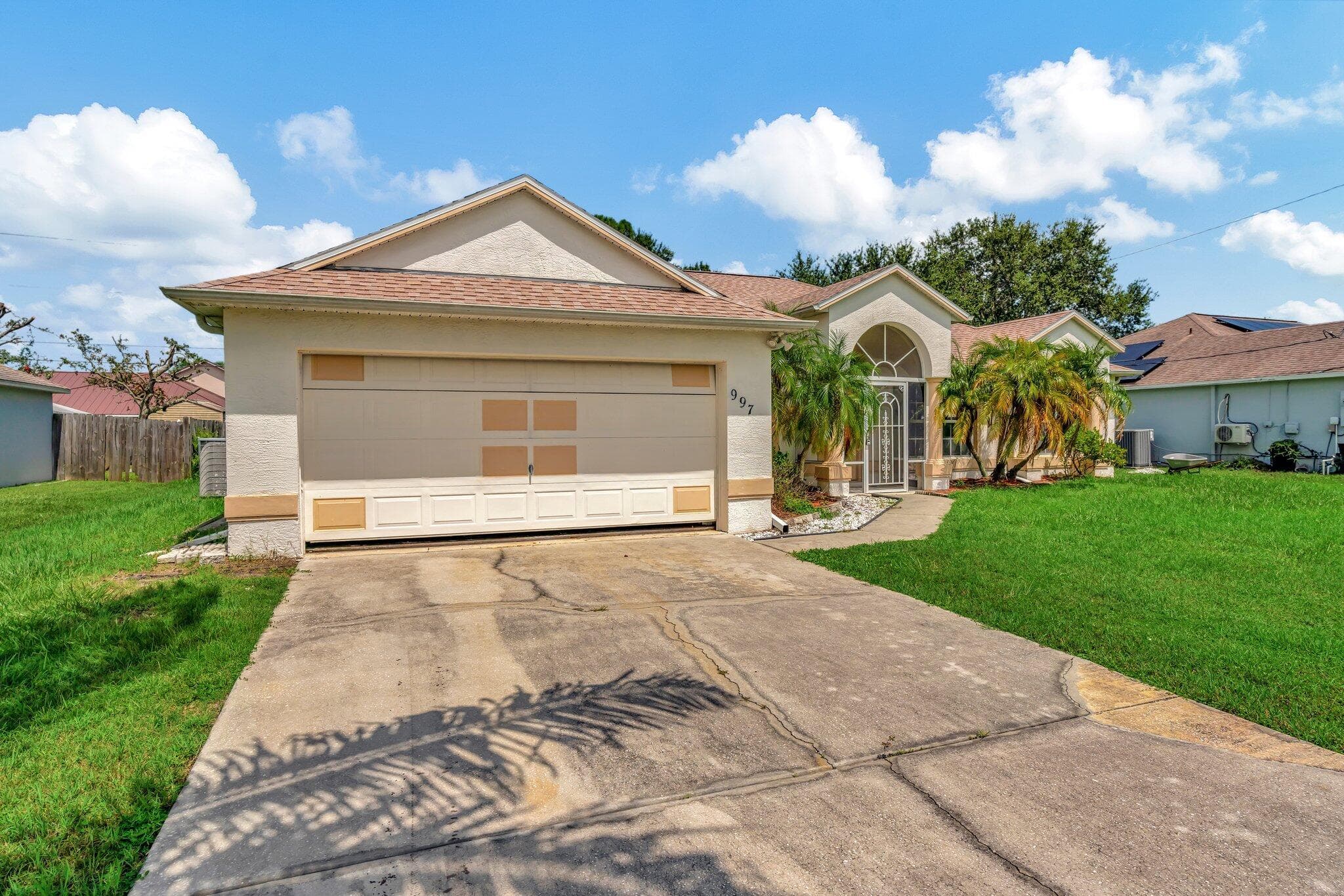 997 SW Eureka Avenue, Port St. Lucie, FL 34953 — photo 1 of 43