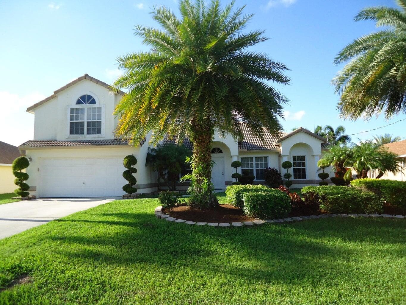 5824 NW Zenith Drive, Port St. Lucie, FL 34986 — photo 1 of 20