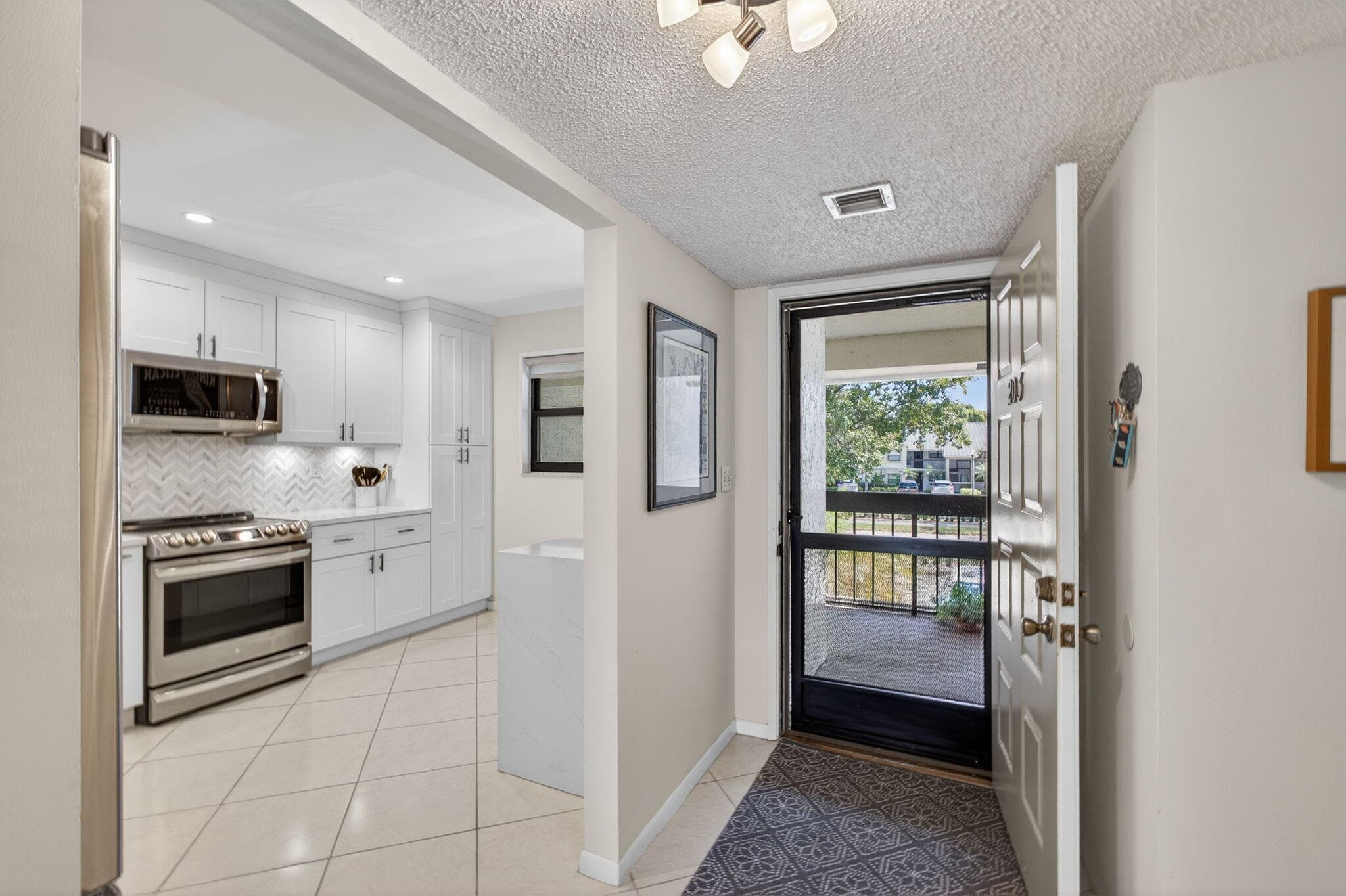 12871 Briarlake Drive 203, Palm Beach Gardens, FL 33418 — photo 2 of 68
