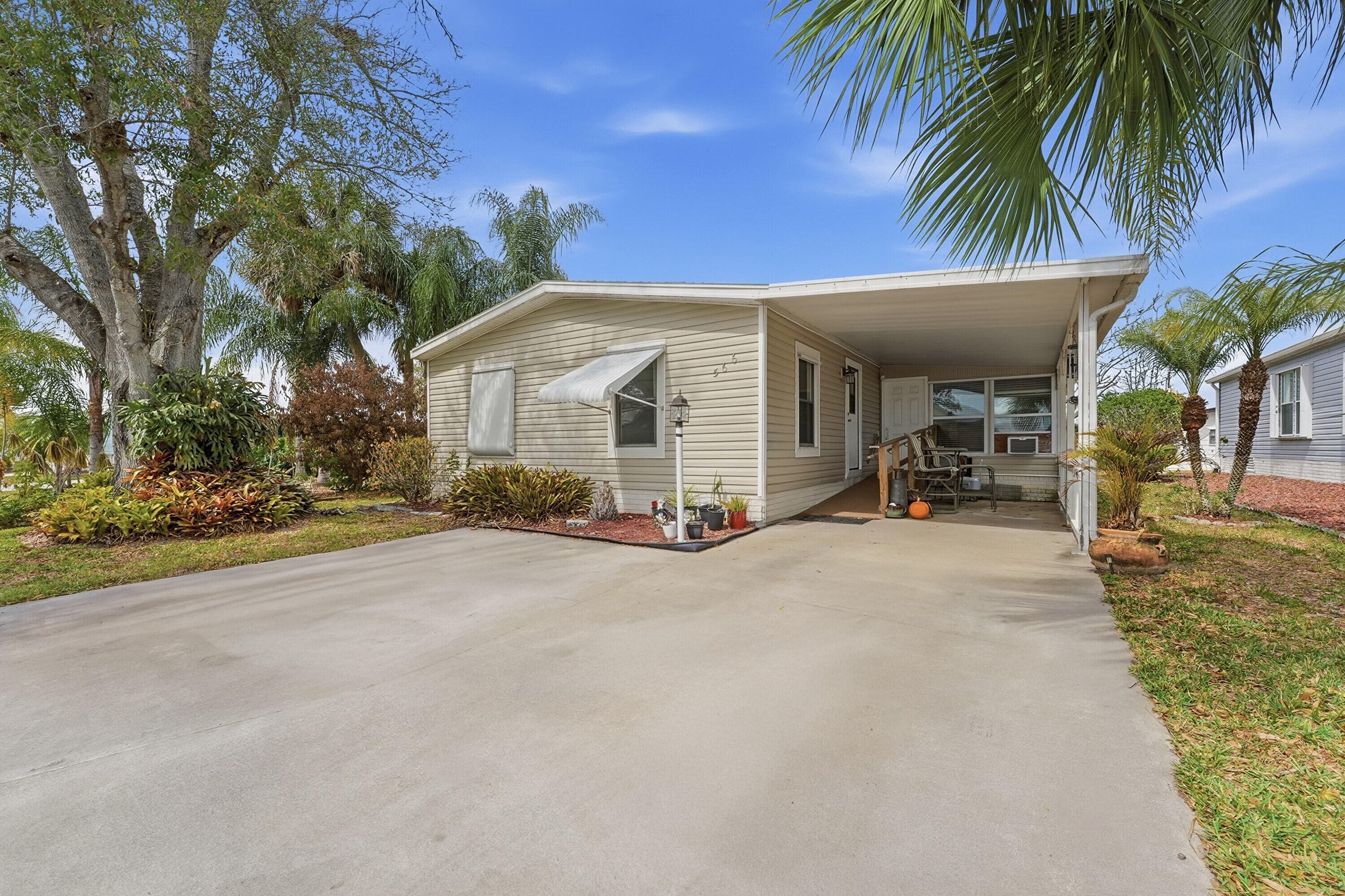 566 Dolphin Circle, Barefoot Bay, FL 32976 — photo 2 of 37