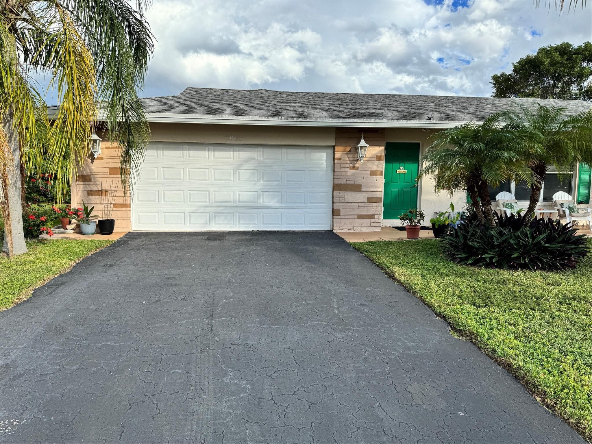 7002 NW 93rd Avenue, Tamarac, FL 33321 — photo 1 of 20