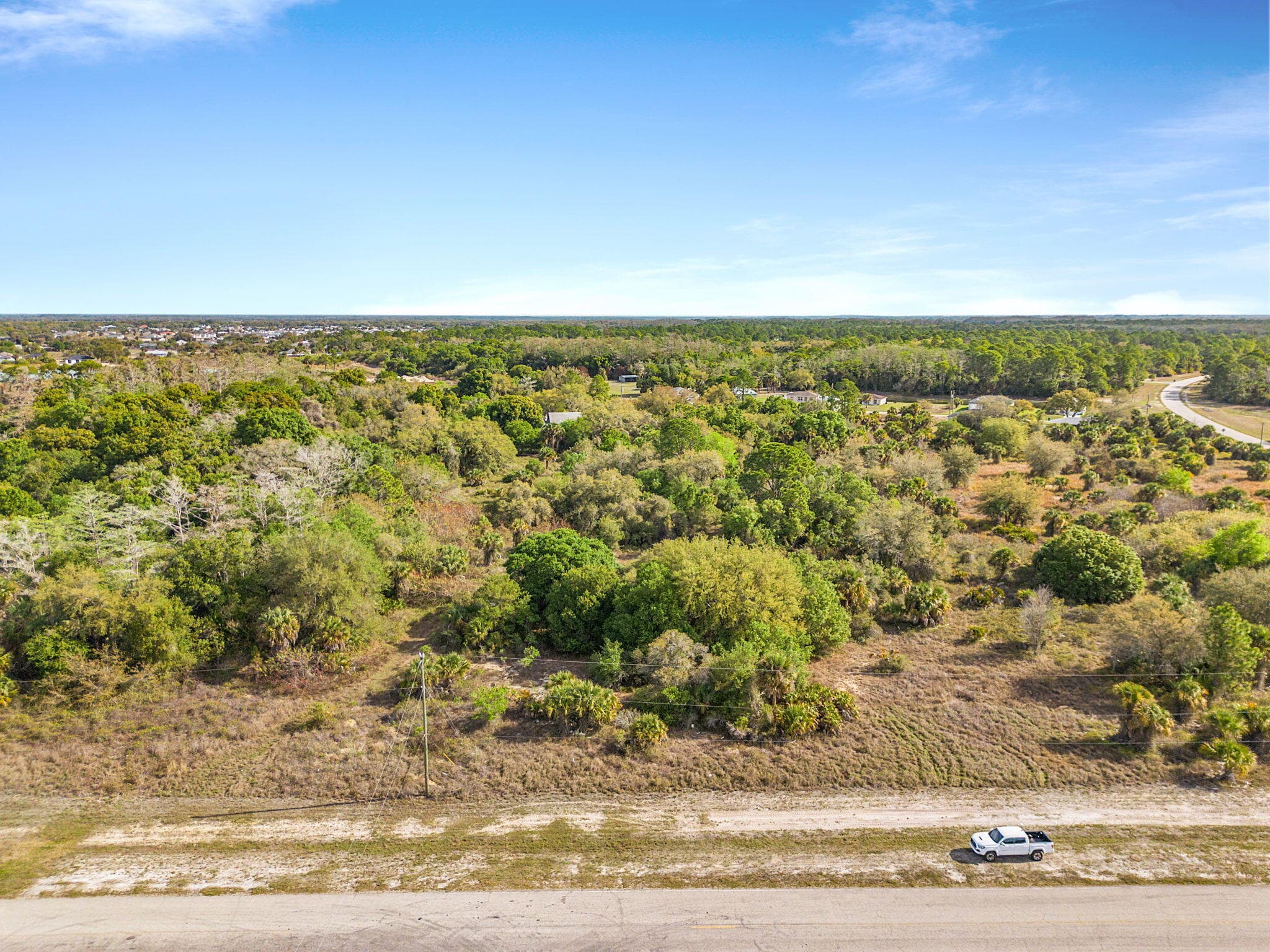7400 NE Raintree Boulevard, LaBelle, FL 33935 — photo 1 of 13