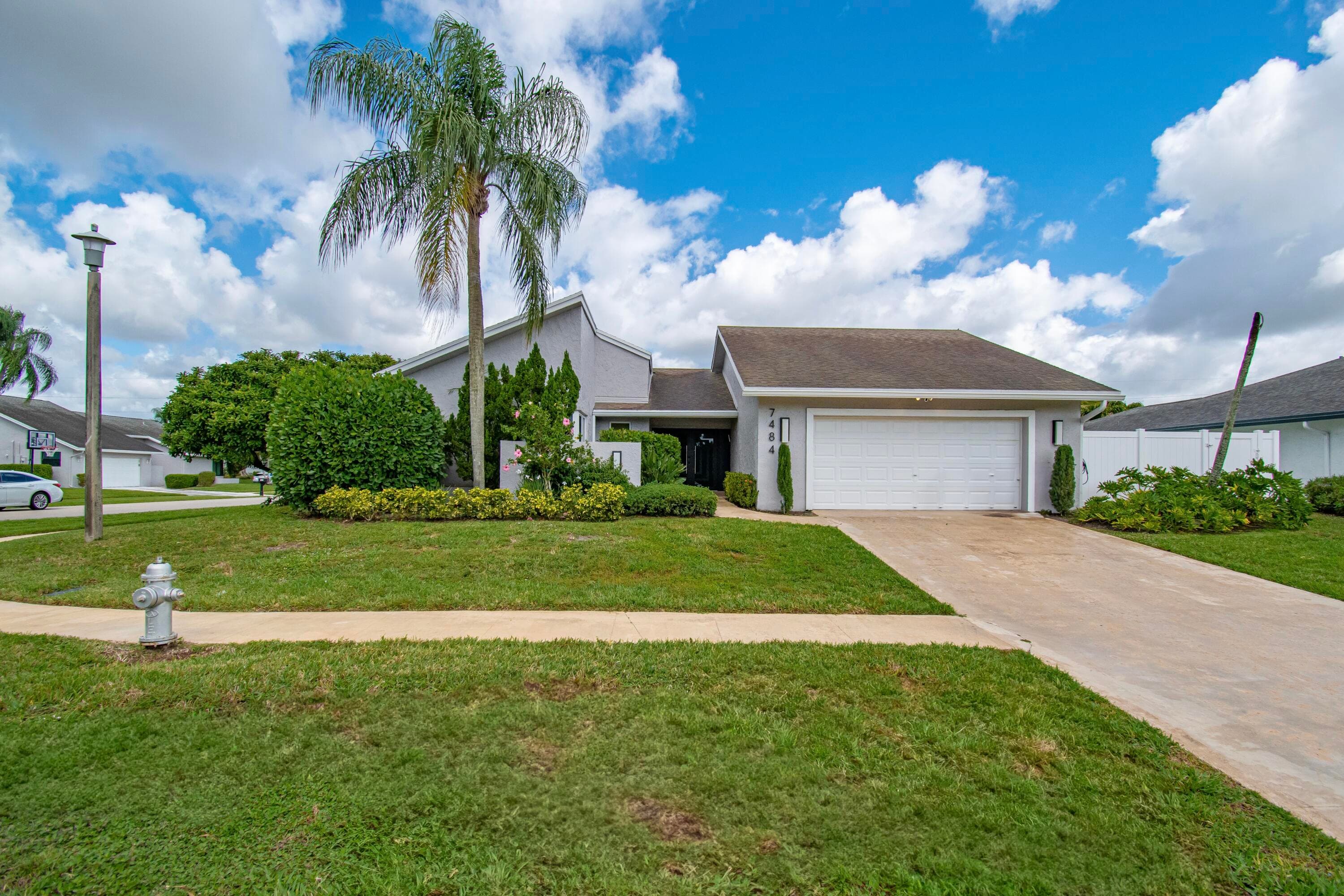 7484 Malibu Crescent, Boca Raton, FL 33433 — photo 1 of 54