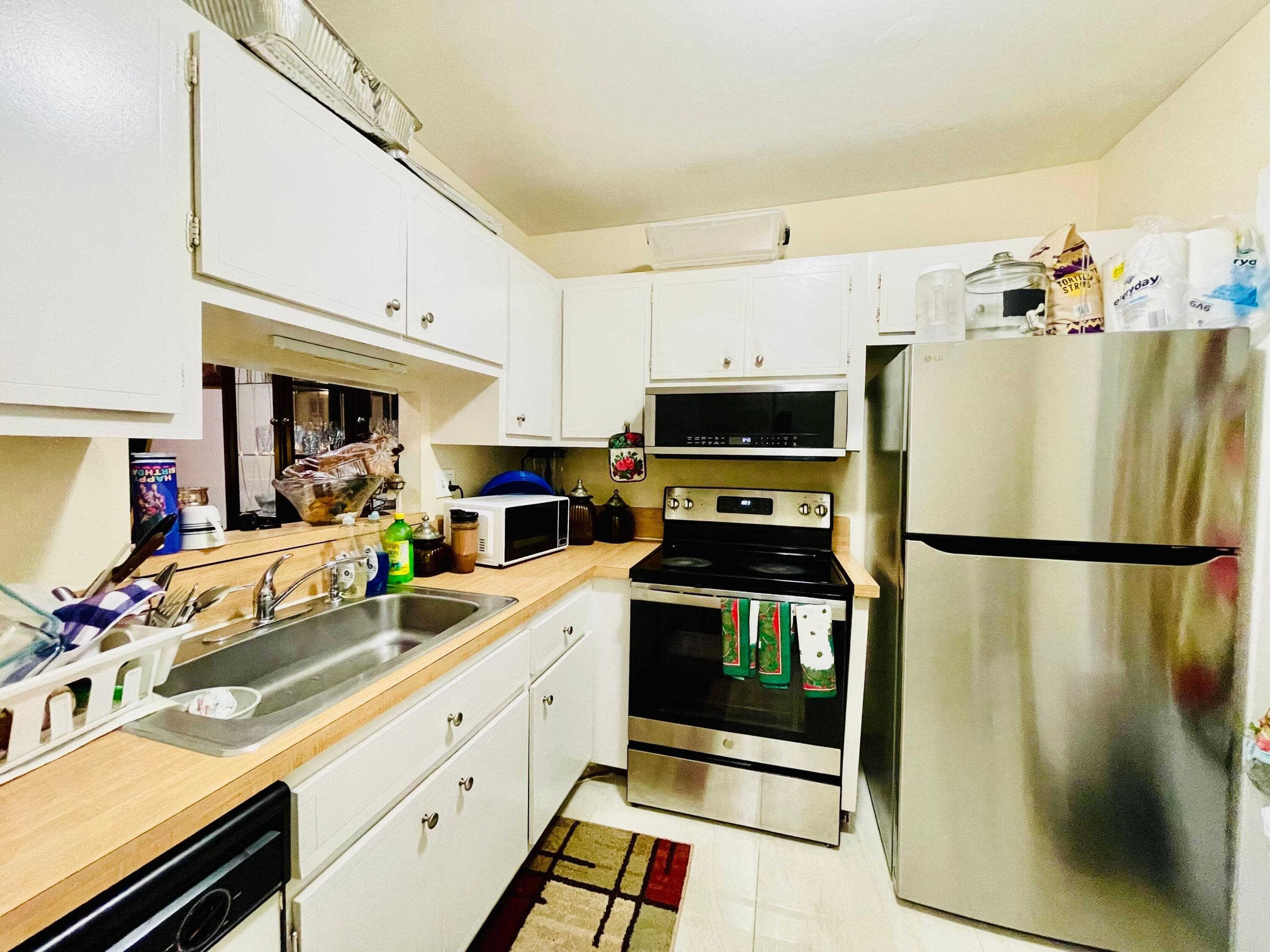 5051 W Oakland Park Boulevard W Unit E212, Lauderdale Lakes, FL 33313 — photo 4 of 23