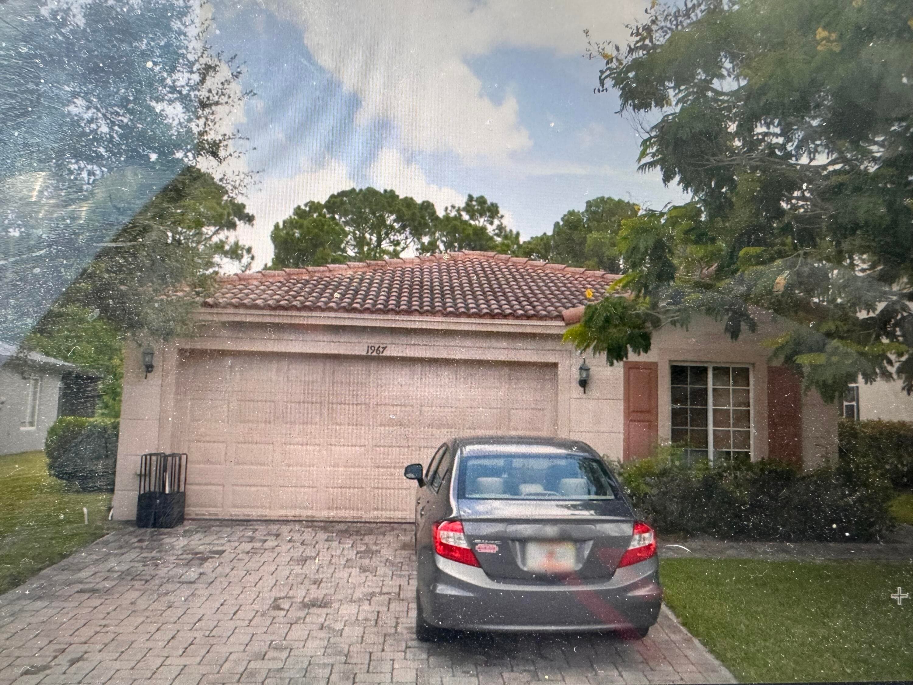 1967 SW Newport Isles Boulevard, Port St. Lucie, FL 34953 — photo 1 of 12