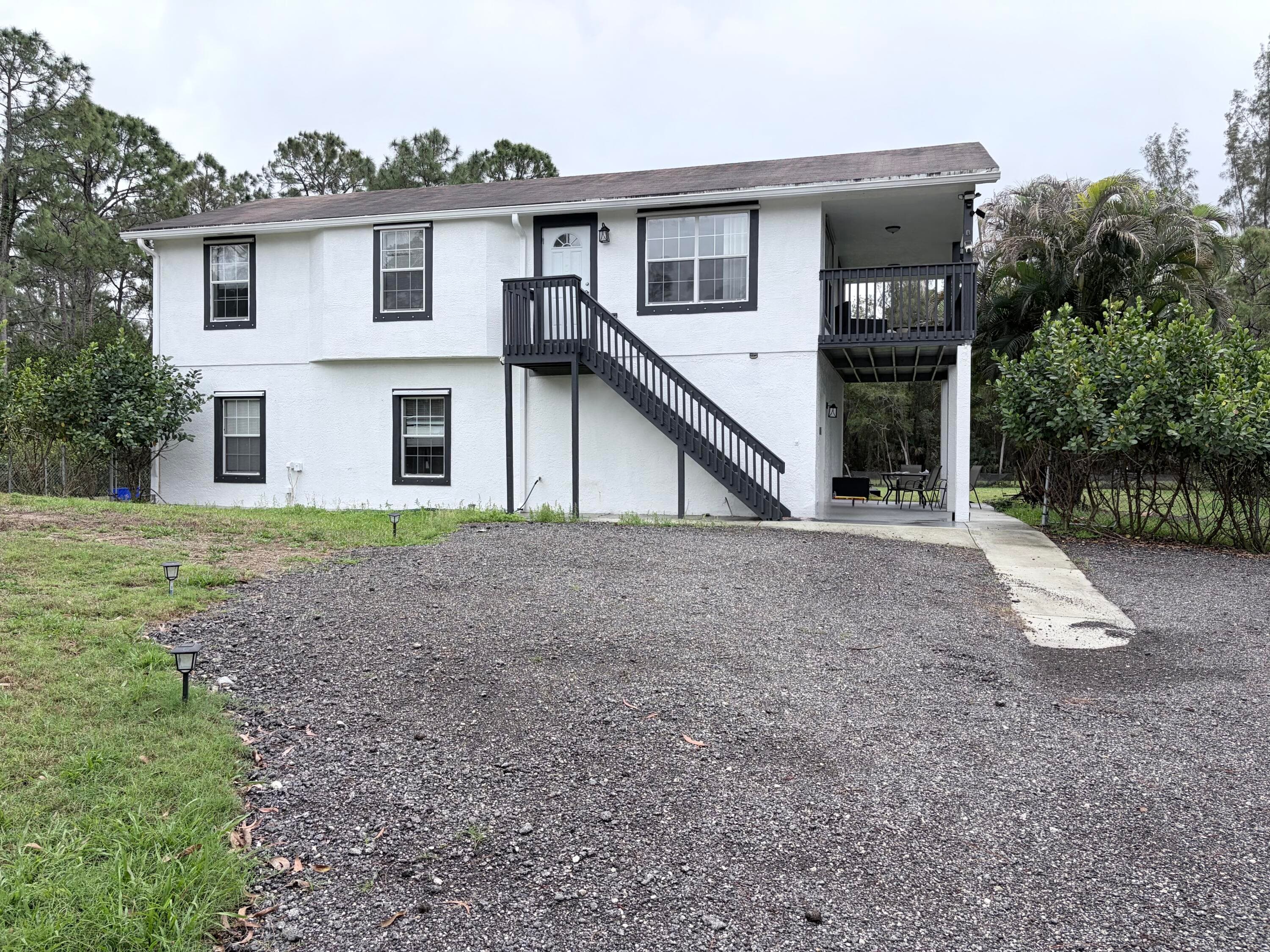 11128 N 59th St Street N, The Acreage, FL 33411 — photo