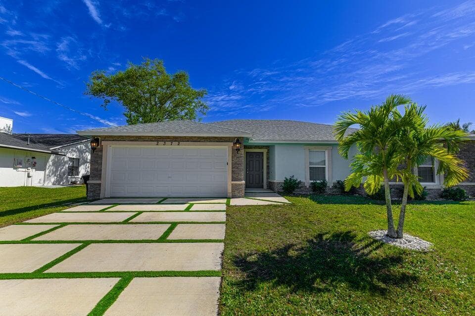 2372 SE Maslan Avenue, Port St. Lucie, FL 34952 — photo 2 of 44