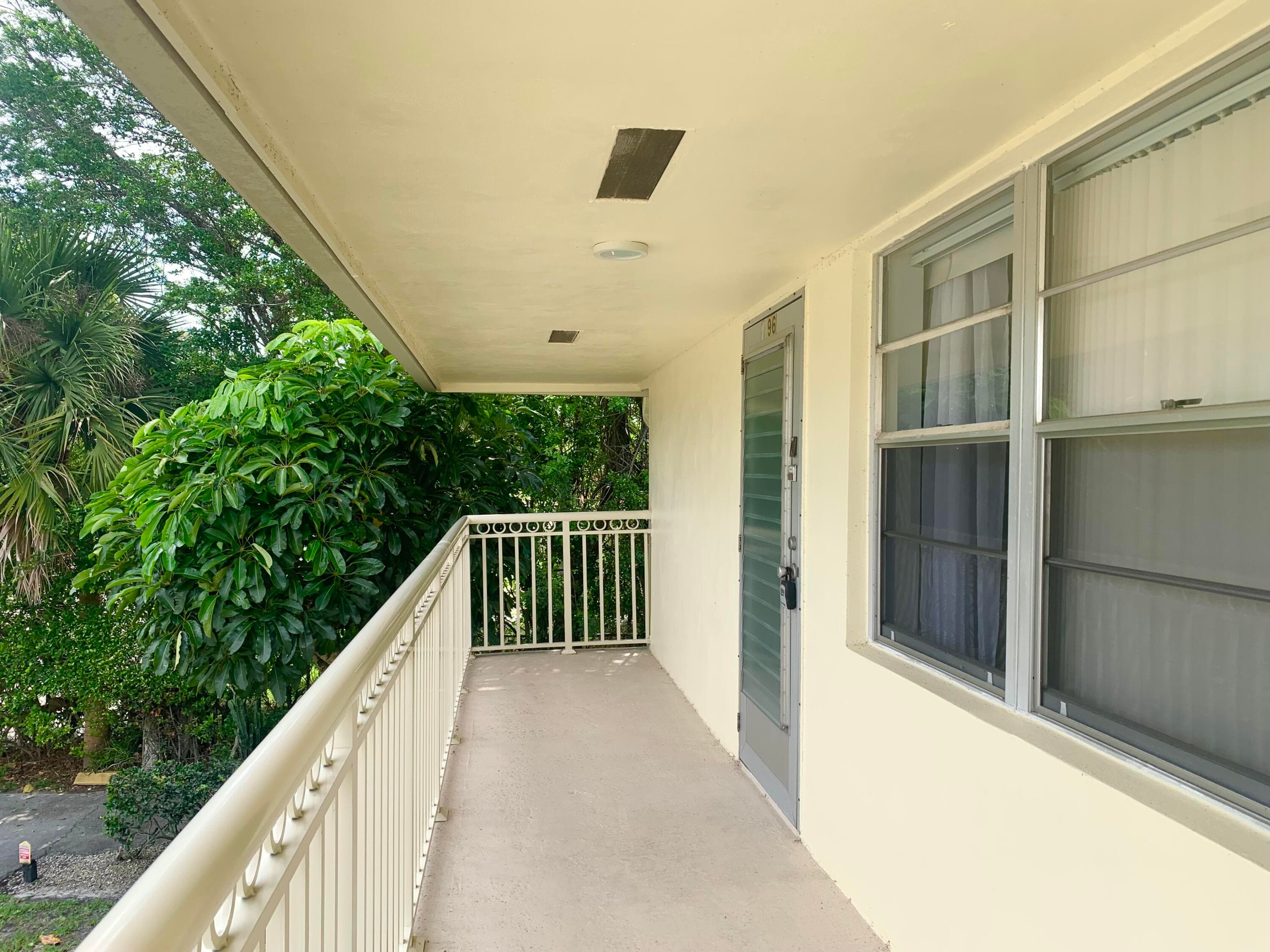 96 Hastings F, West Palm Beach, FL 33417 — photo 1 of 32
