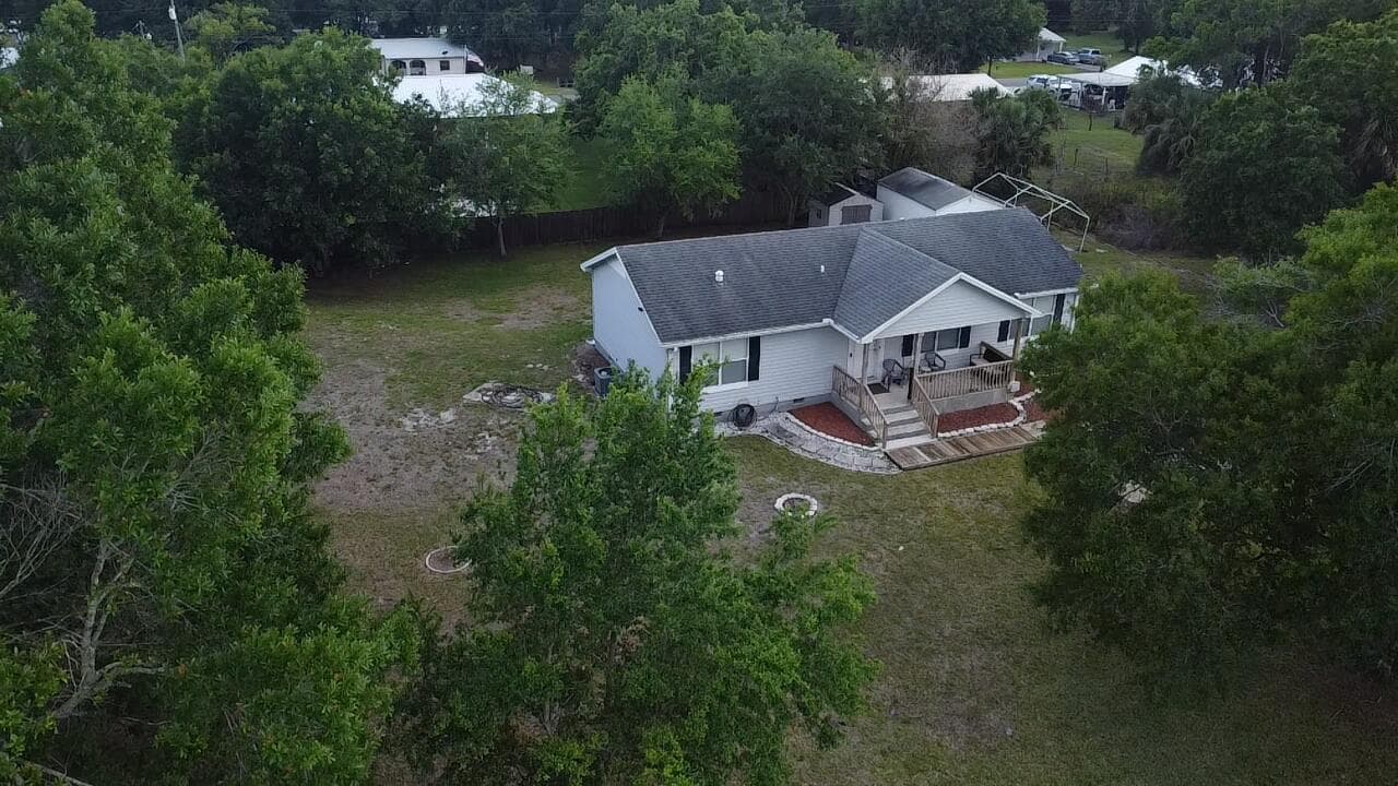 7718 NW 82nd Court, Okeechobee, FL 34972 — photo 1 of 16