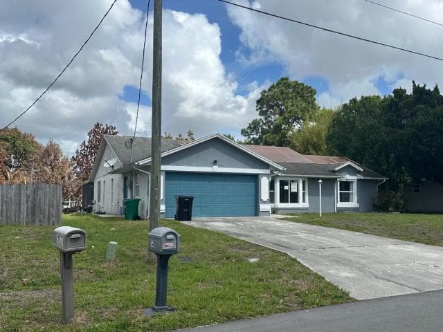 751 SW Monsoon Road, Port St. Lucie, FL 34953 — photo 1 of 22