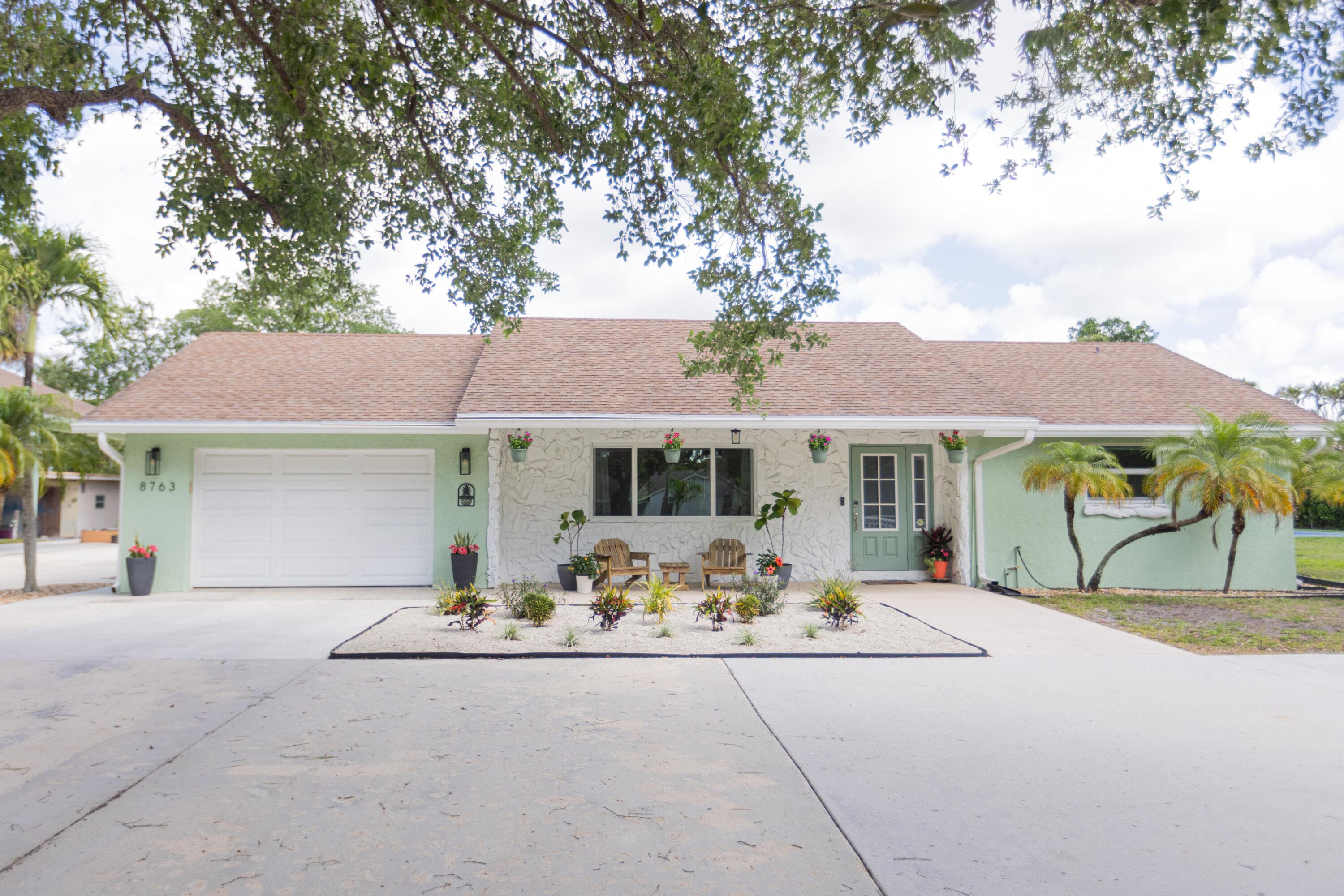 8763 Pinion Drive, Lake Worth, FL 33467 — photo 1 of 59