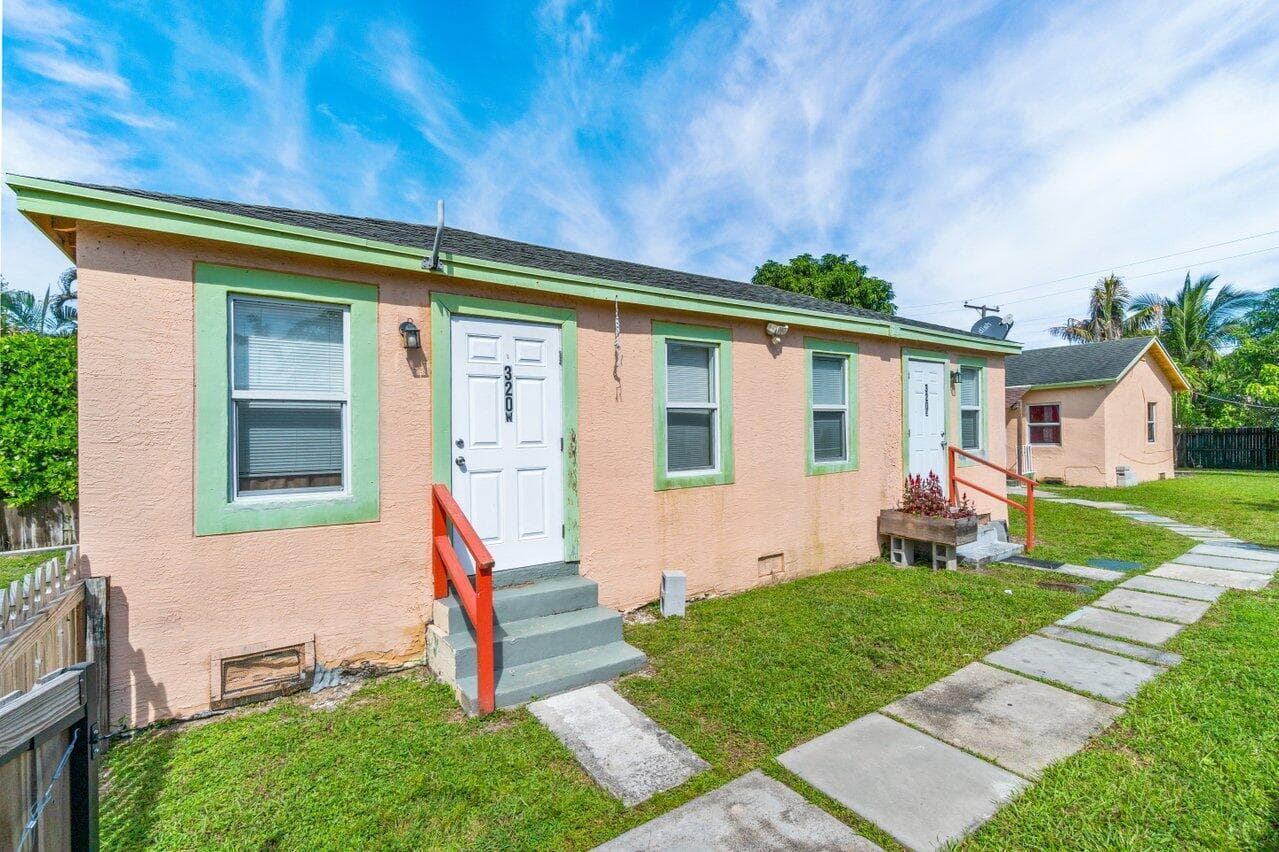 320 Swain Boulevard, Greenacres, FL 33463 — photo 1 of 32