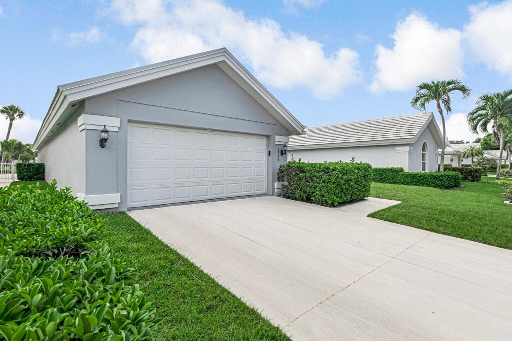2390 Saratoga Bay Drive, West Palm Beach, FL 33409 — photo 1 of 58